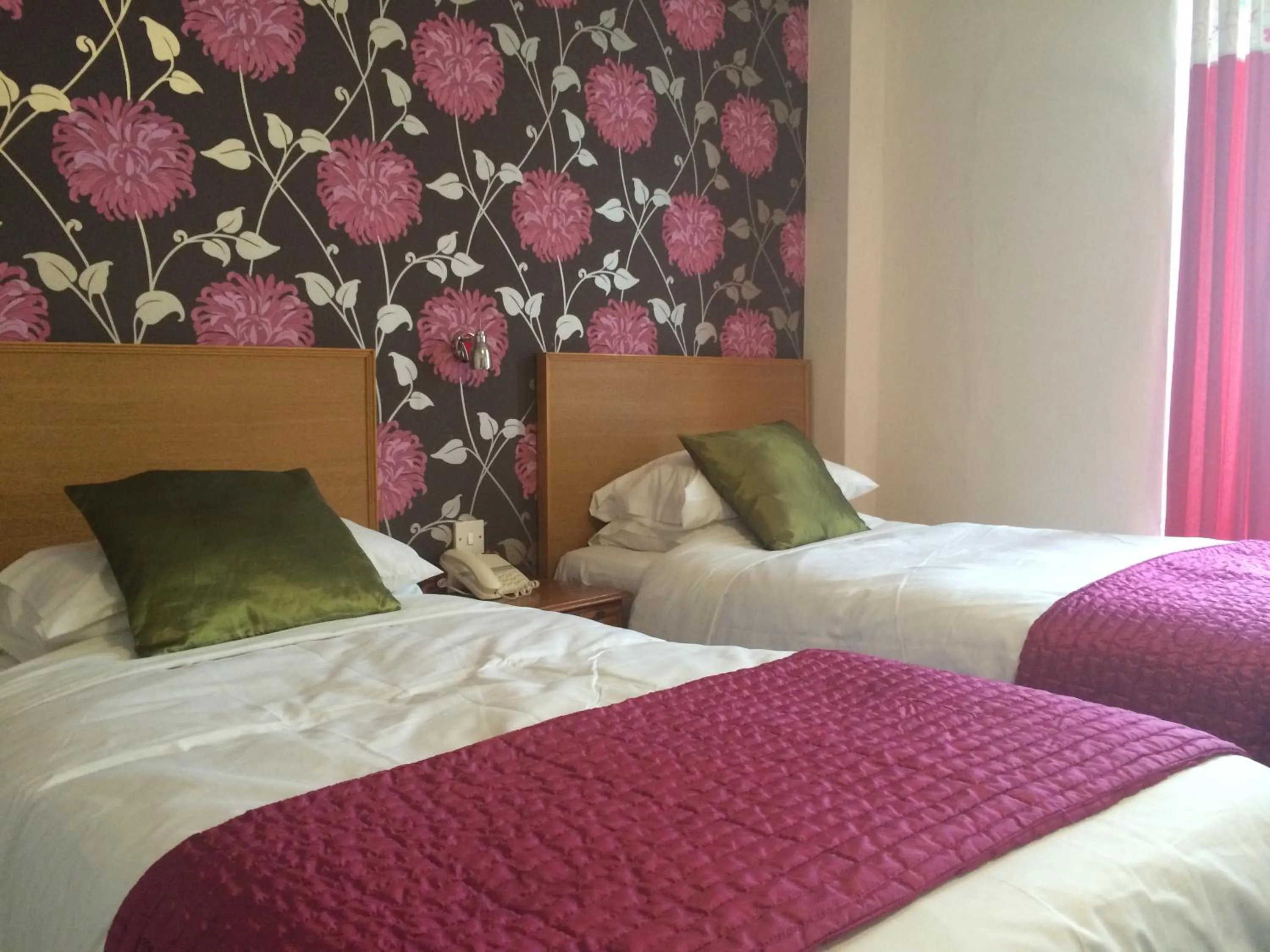 Bed in Tiffany's Hotel