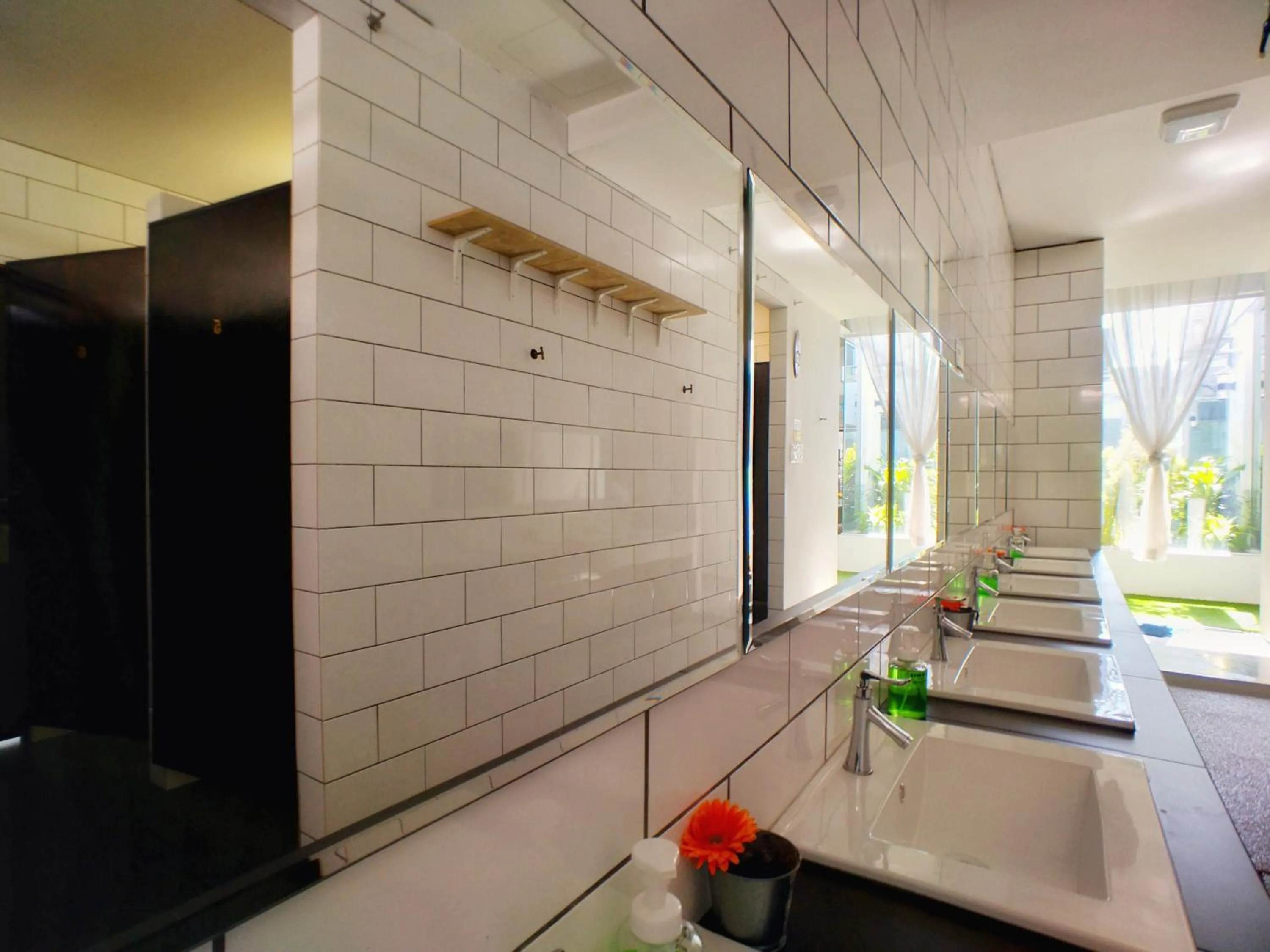 Property building in Beds In Garden Hostel