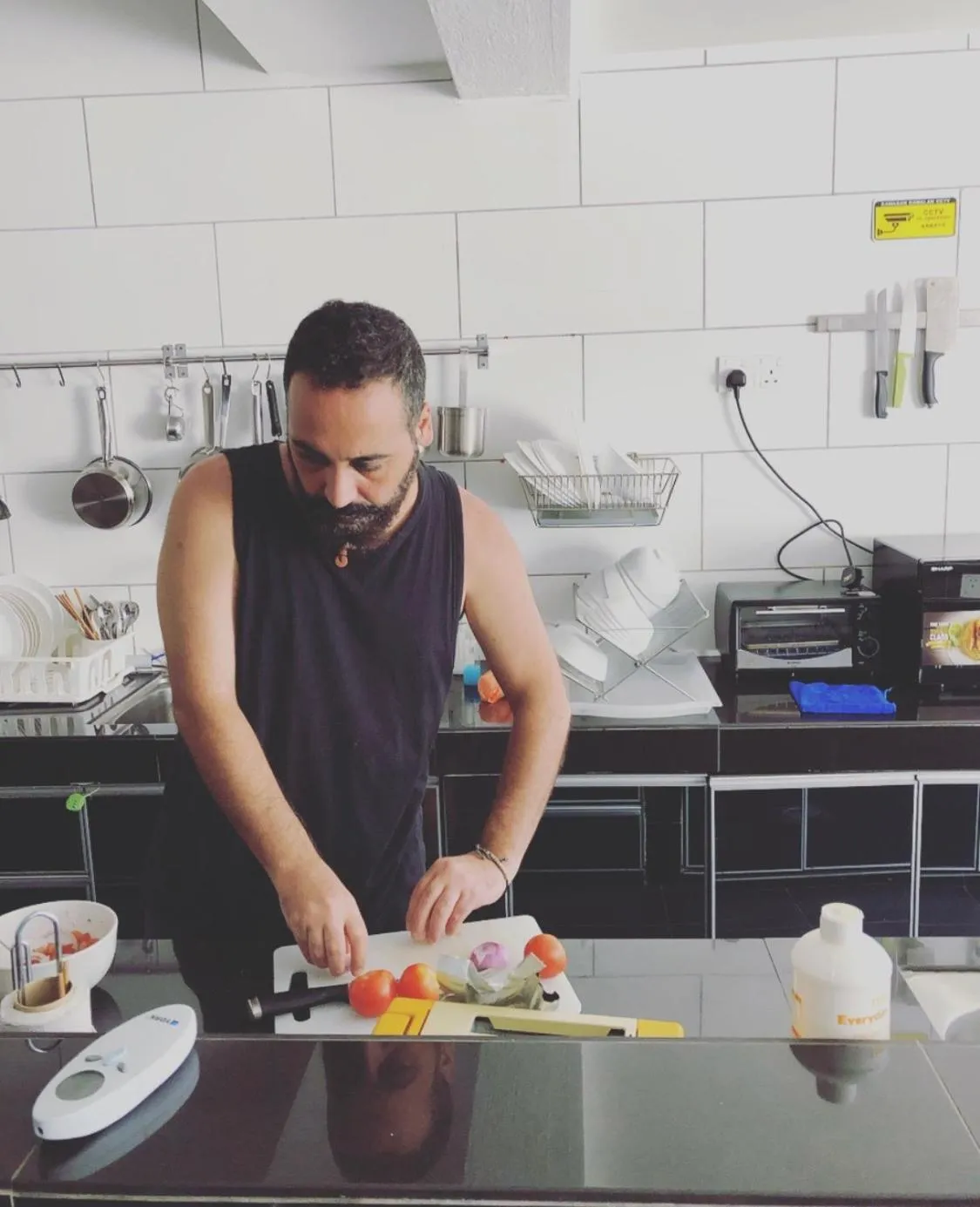 Communal kitchen in Beds In Garden Hostel