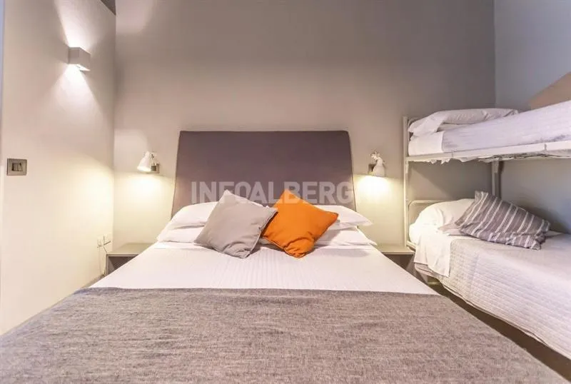 Bed in Albergo Aquila