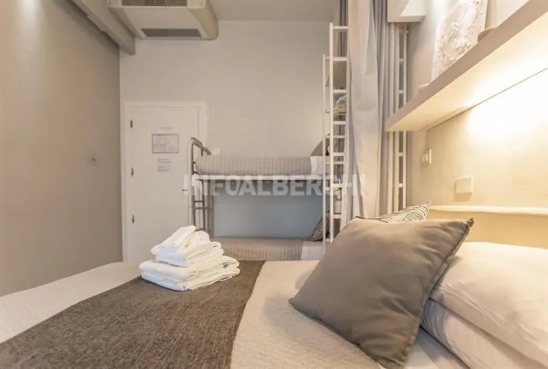 Bed in Albergo Aquila