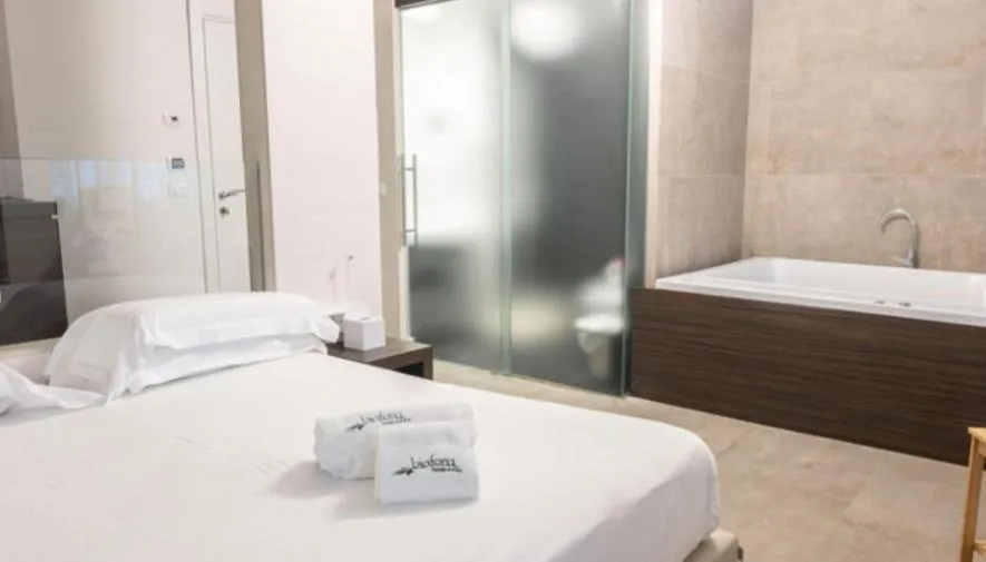 Bed in Biafora Resort & Spa