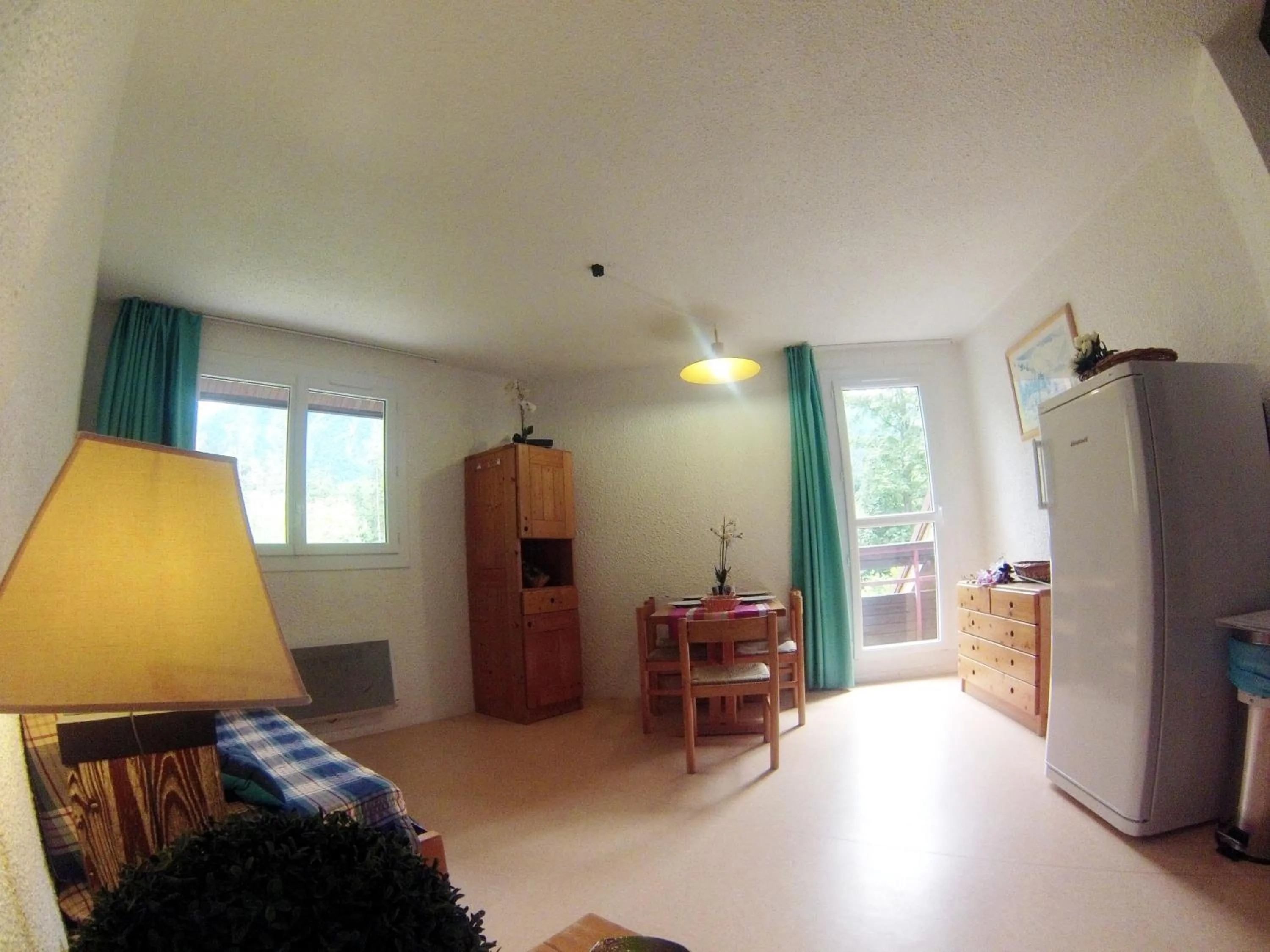 Living room, Bed in Village vacances du Haut-Bréda aux 7 Laux