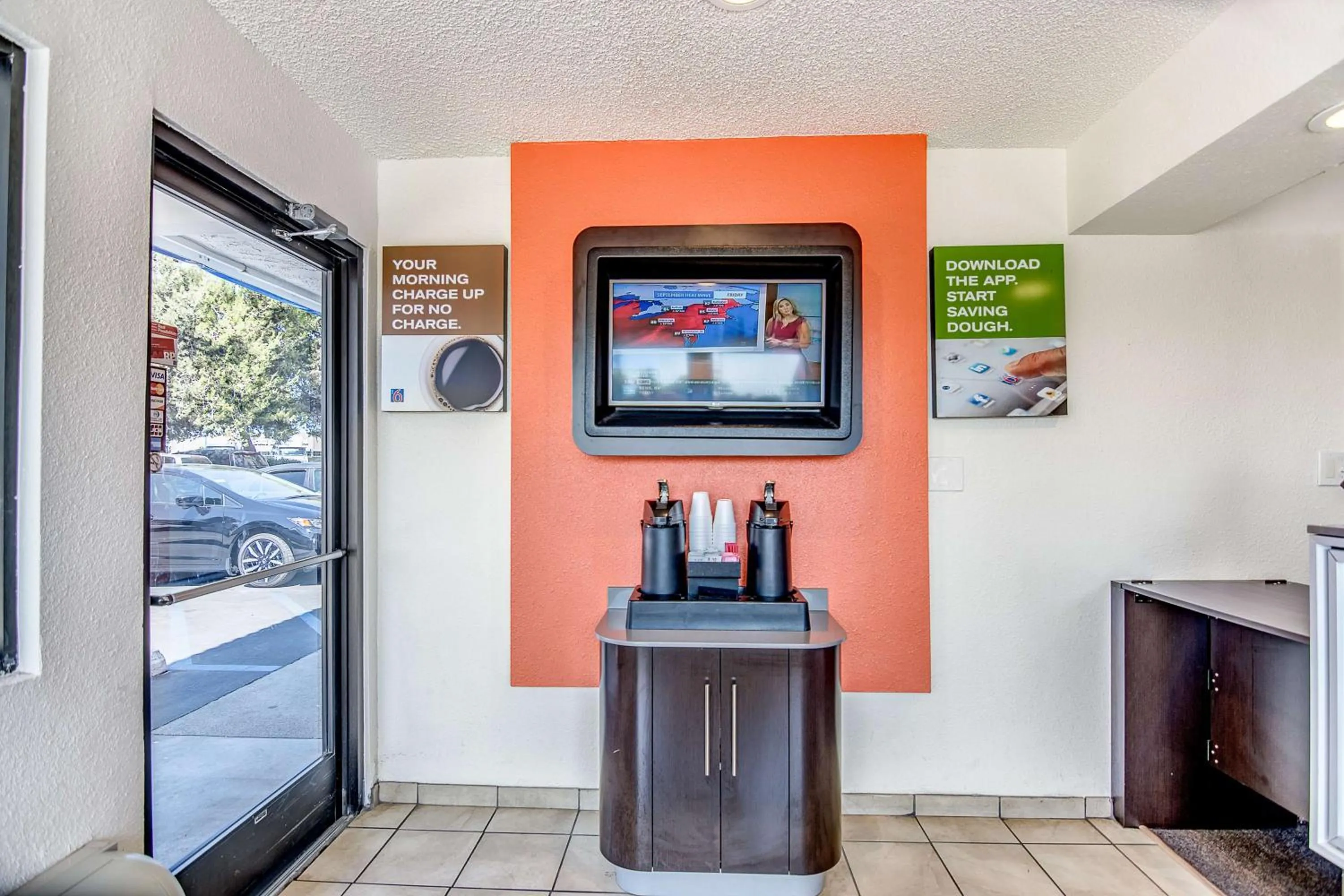 Communal lounge/ TV room in Motel 6-Stockton, CA - Charter Way West