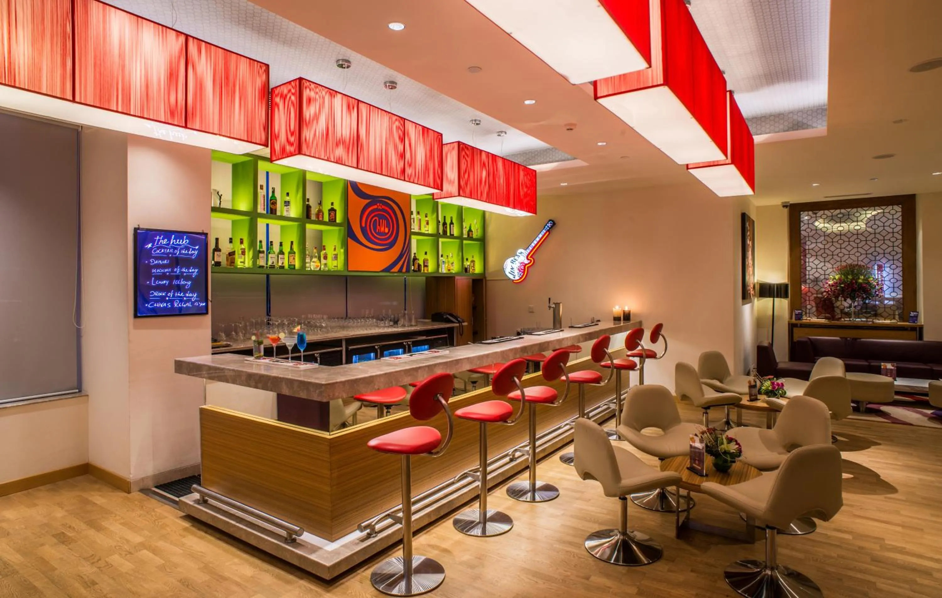 Lounge or bar in ibis Bengaluru Hosur Road - An Accor Brand