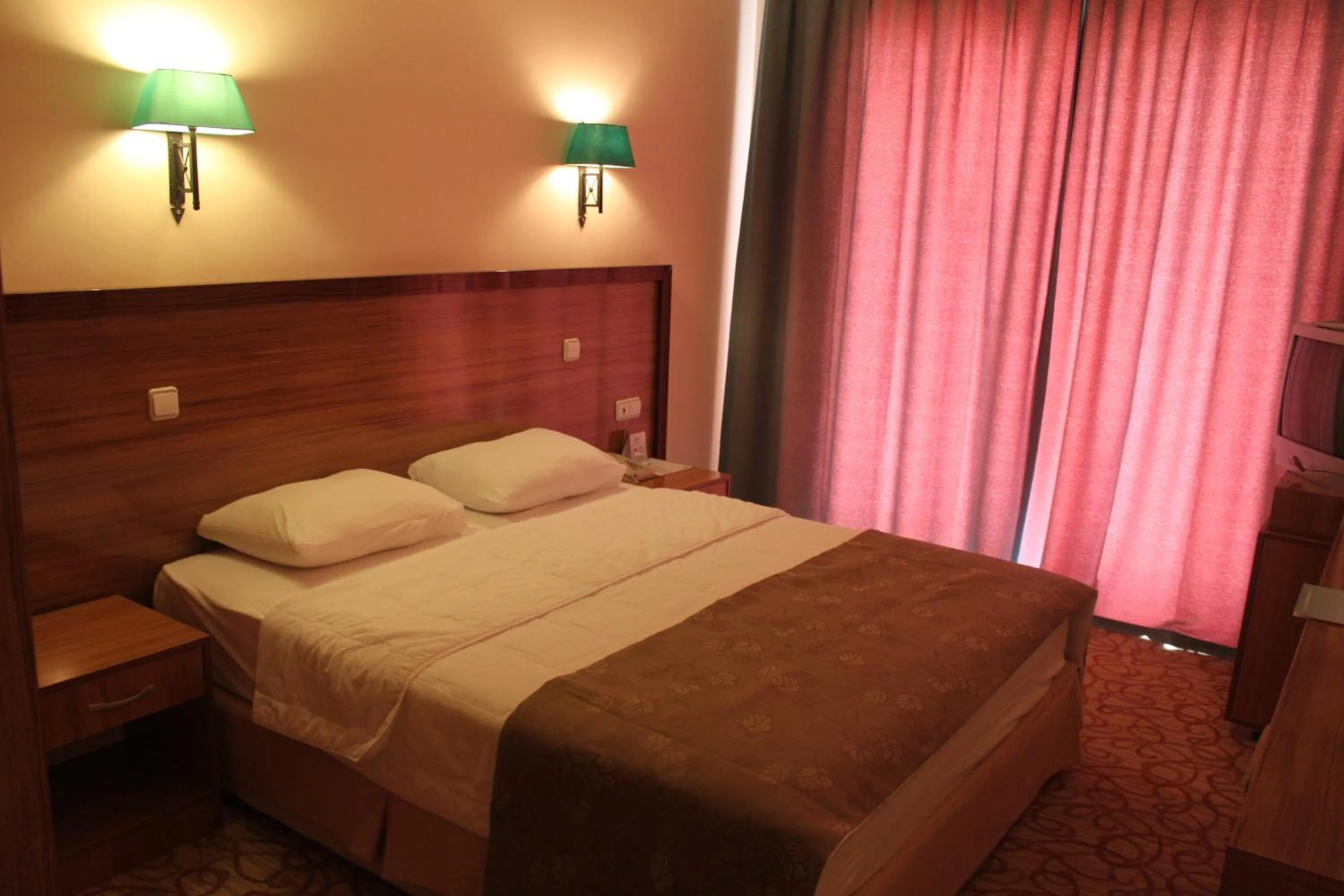 Bed in Green Nature Resort and Spa