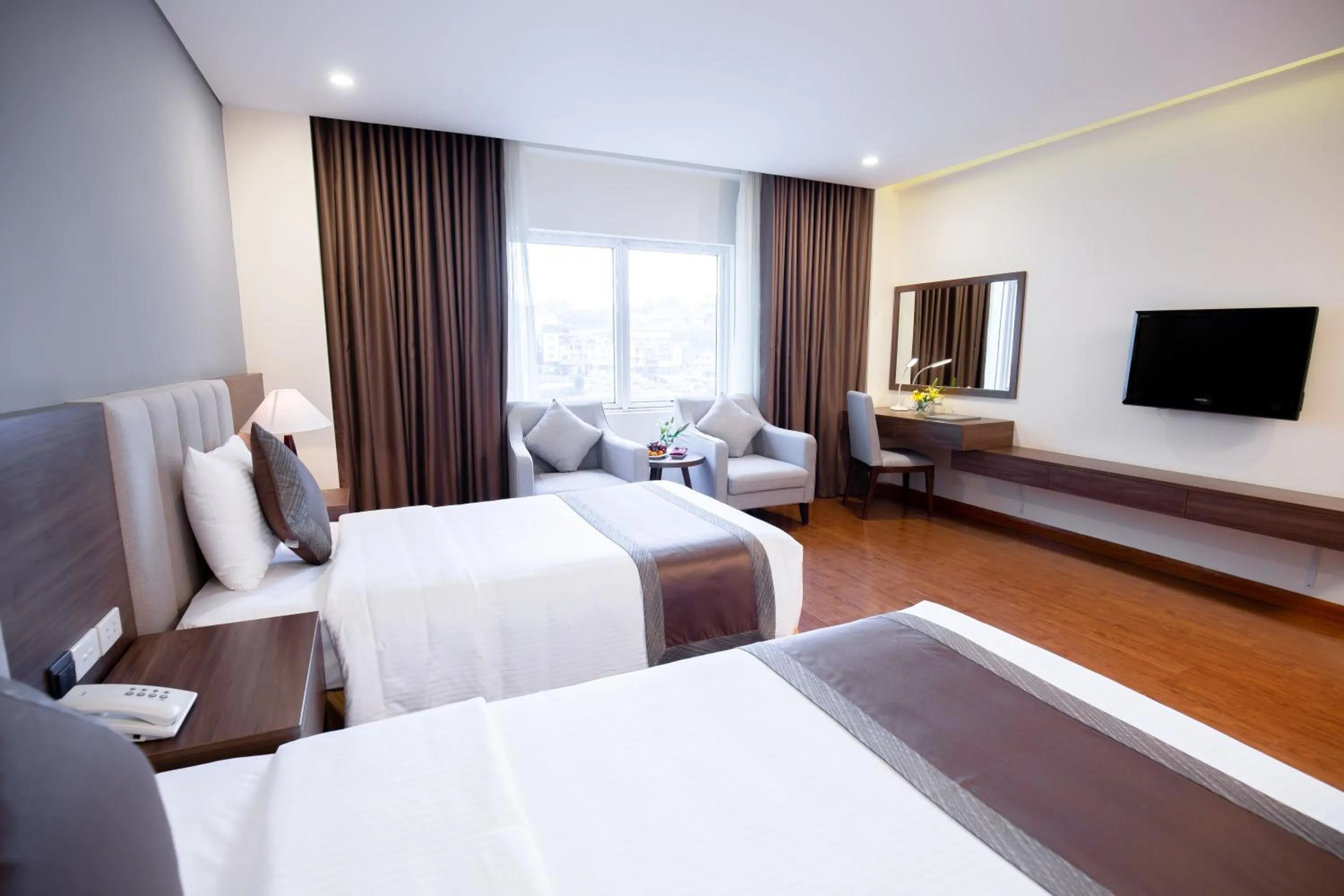 Photo of the whole room, Bed in Muong Thanh Sapa Hotel