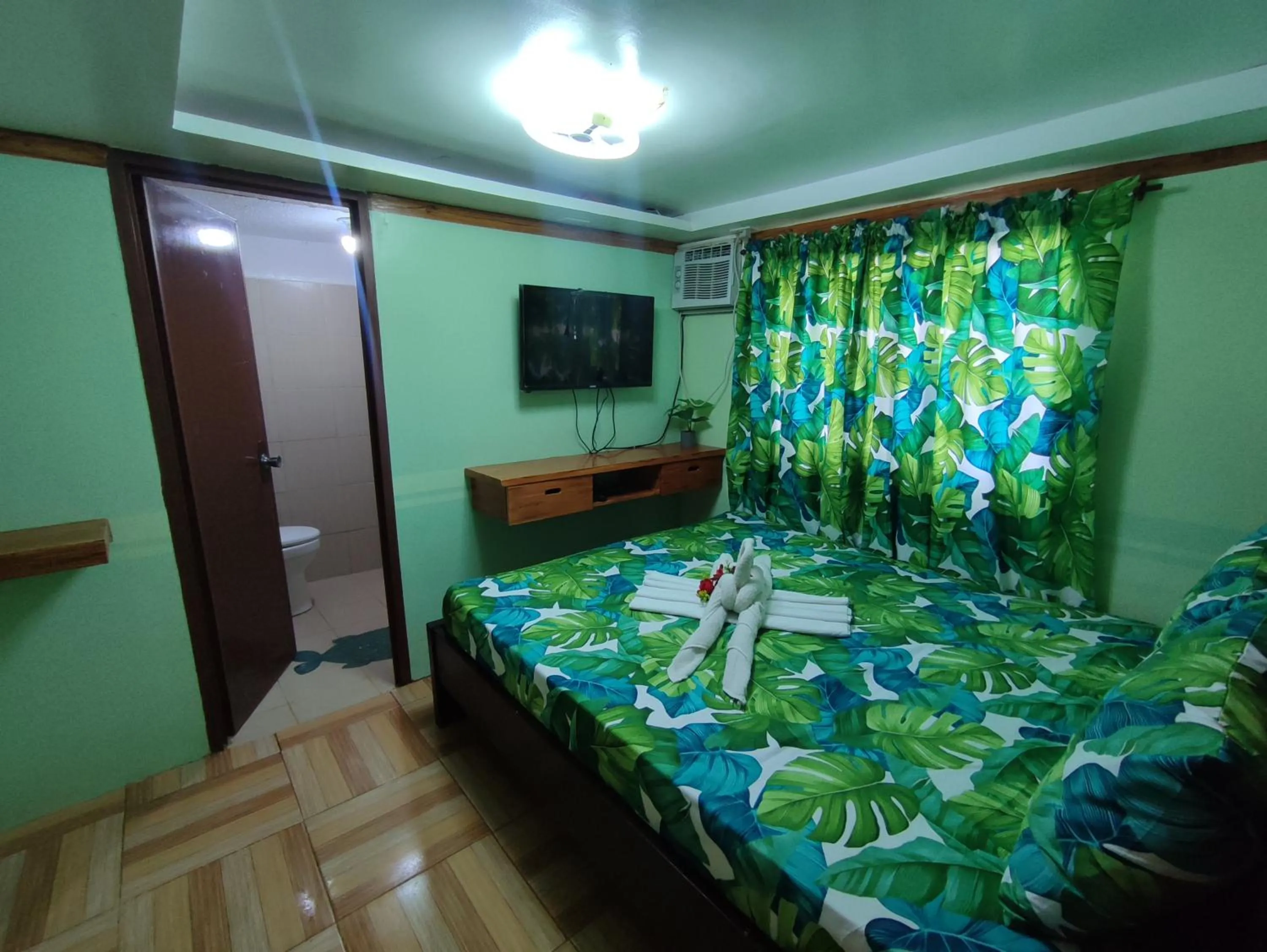 Bed in Blue Lagoon Inn and Restaurant, Pagudpud