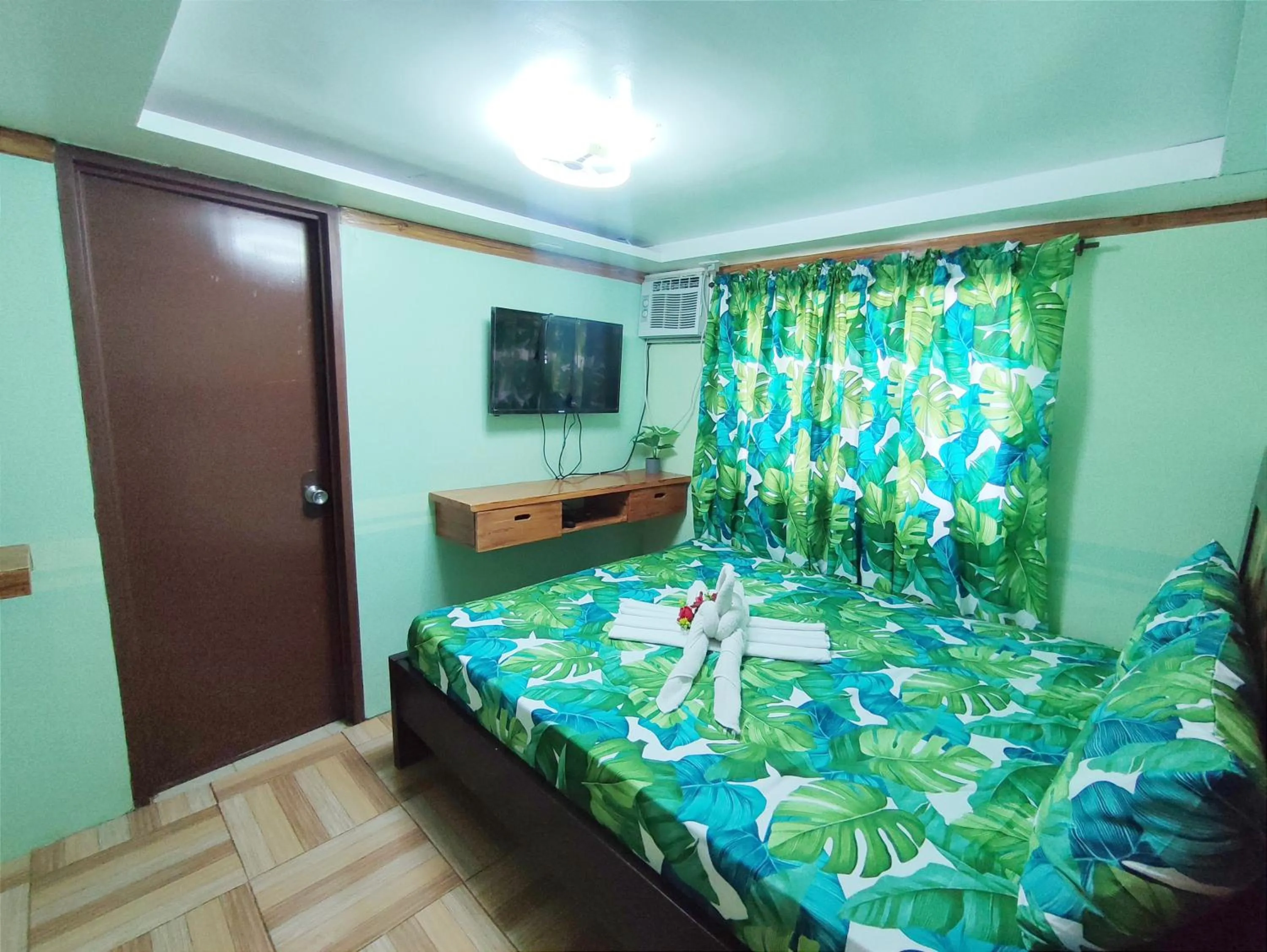 Bed in Blue Lagoon Inn and Restaurant, Pagudpud