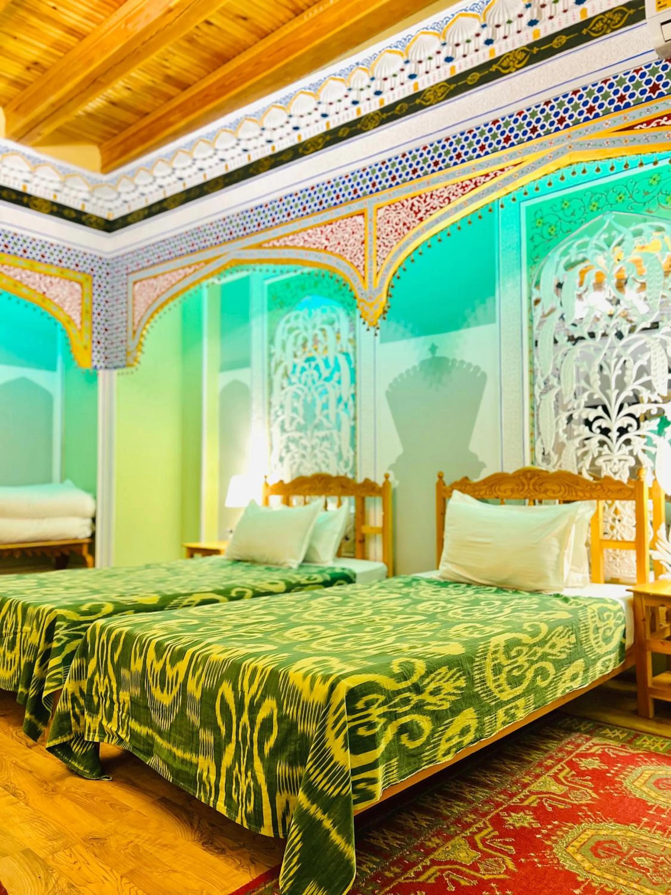 Bed in Komil Bukhara Boutique Hotel