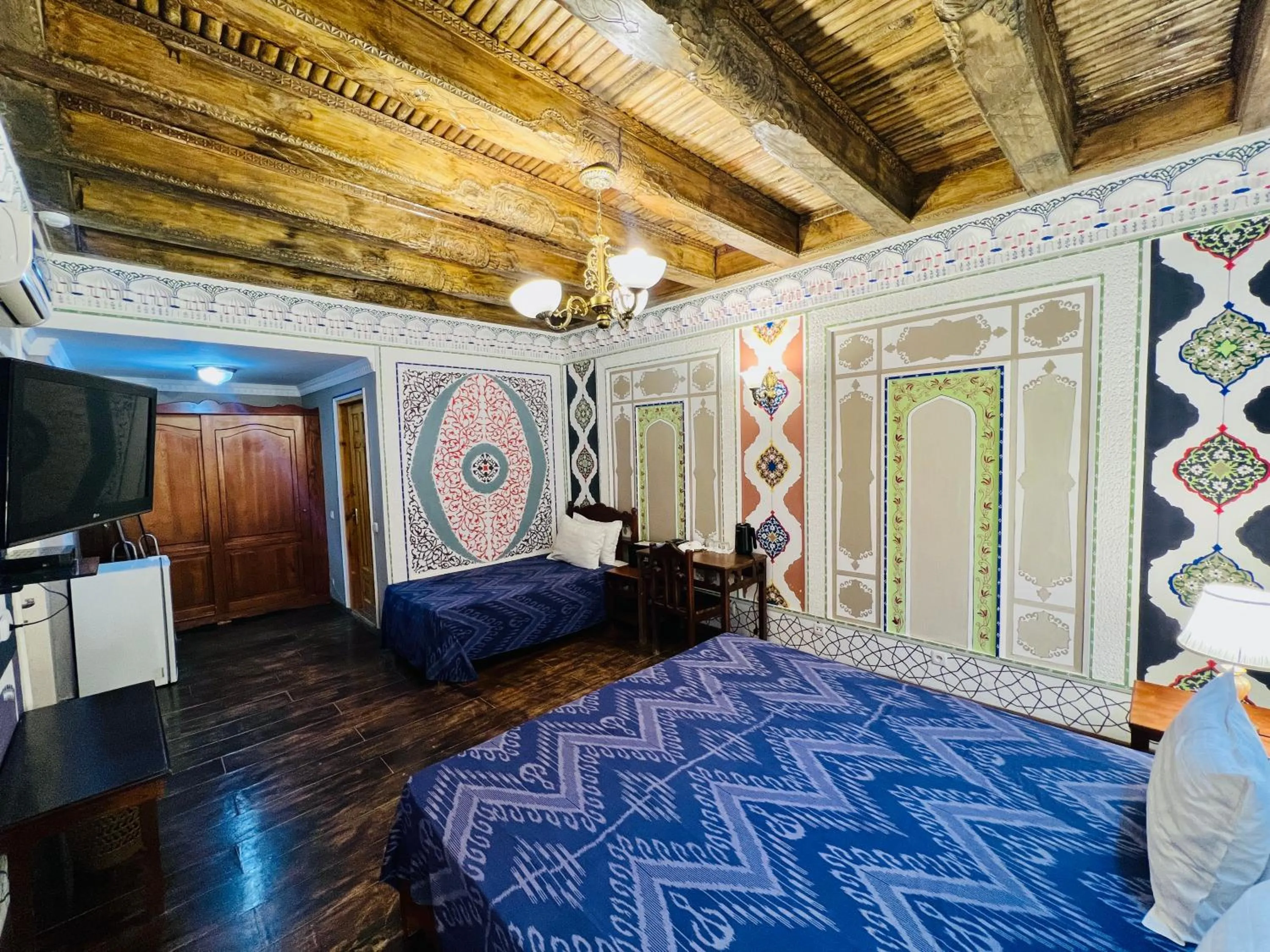 Bed in Komil Bukhara Boutique Hotel