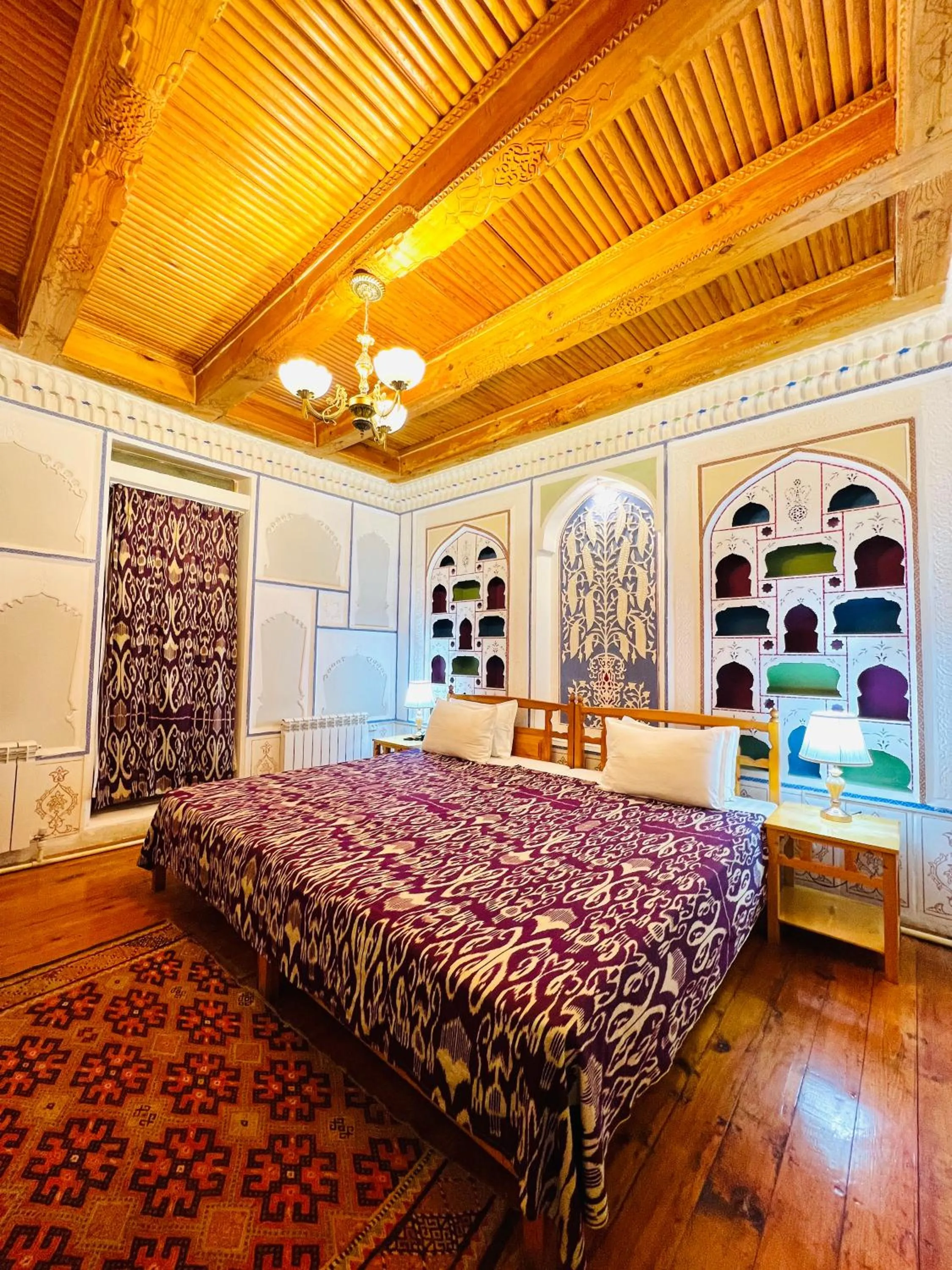 Bed in Komil Bukhara Boutique Hotel