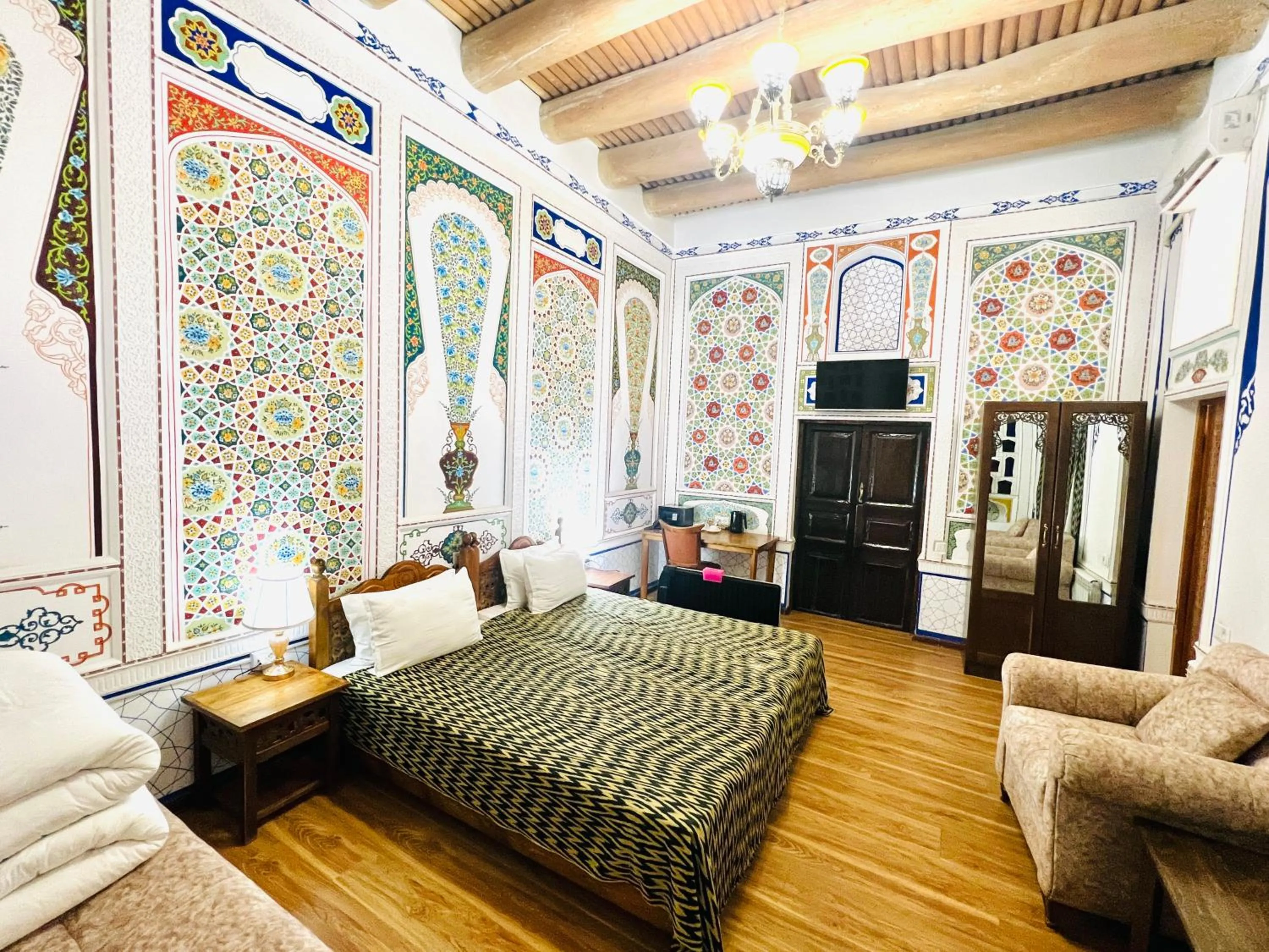 Bed in Komil Bukhara Boutique Hotel