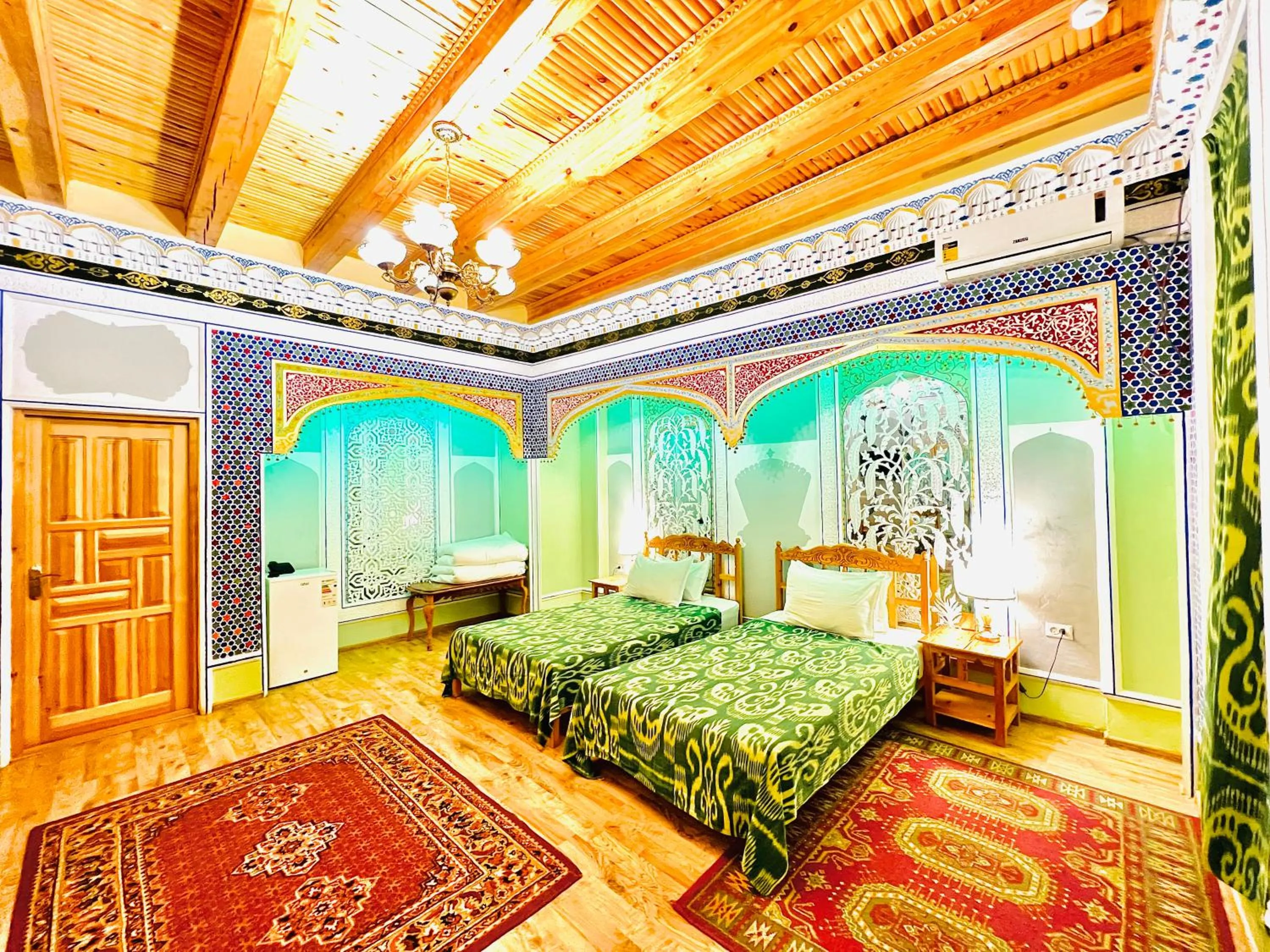 Bed in Komil Bukhara Boutique Hotel
