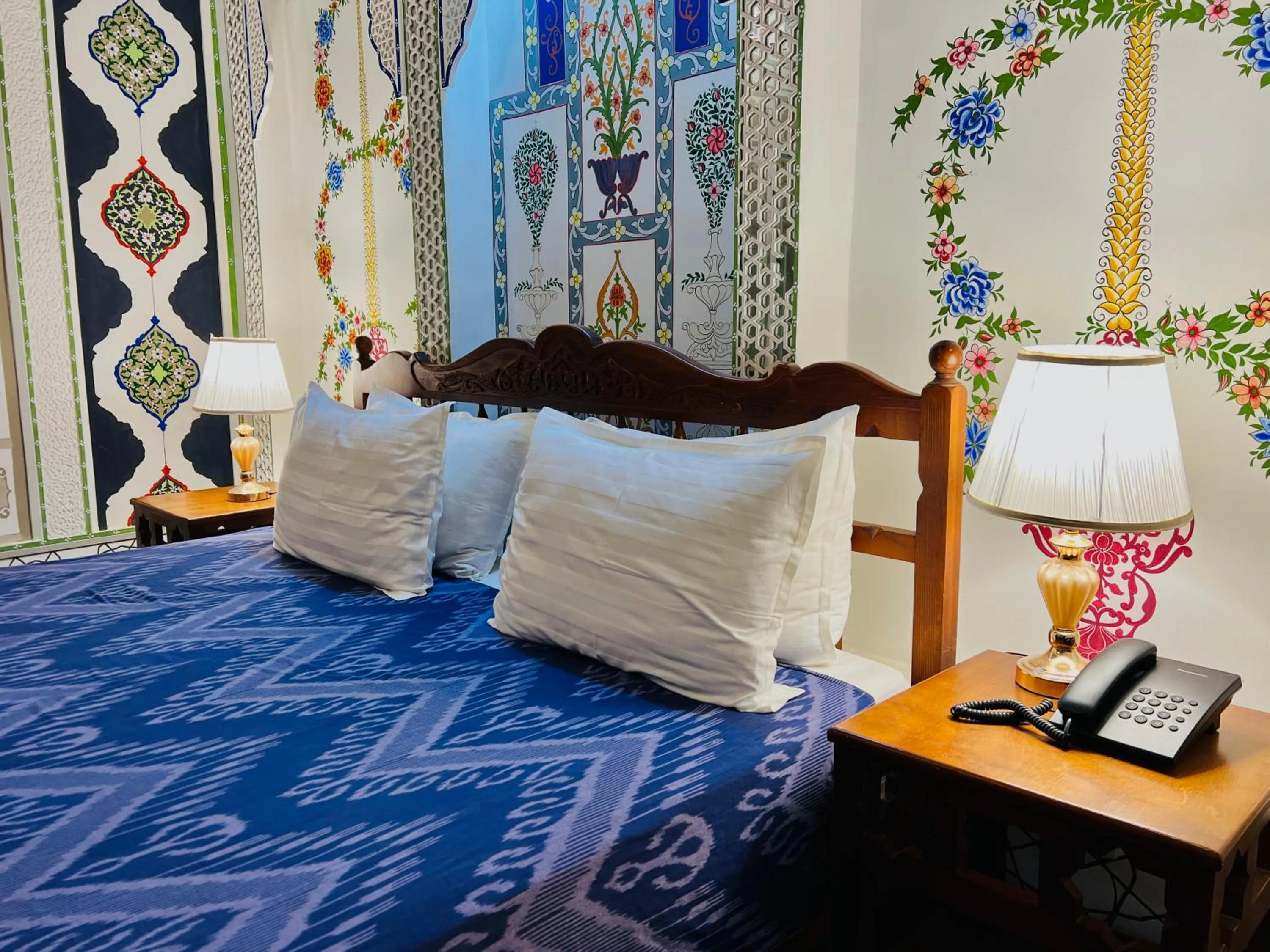 Bed in Komil Bukhara Boutique Hotel