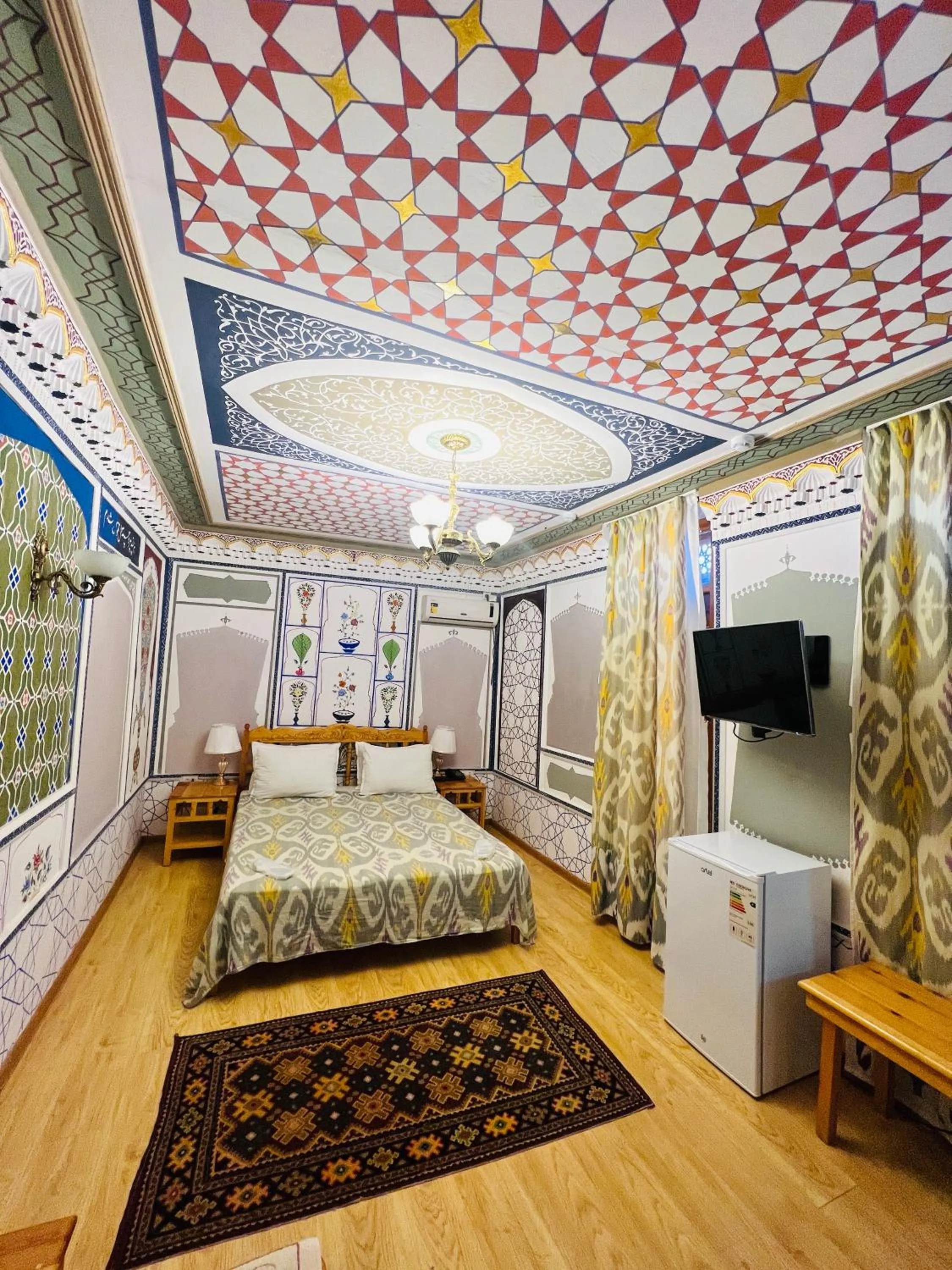 Bed in Komil Bukhara Boutique Hotel