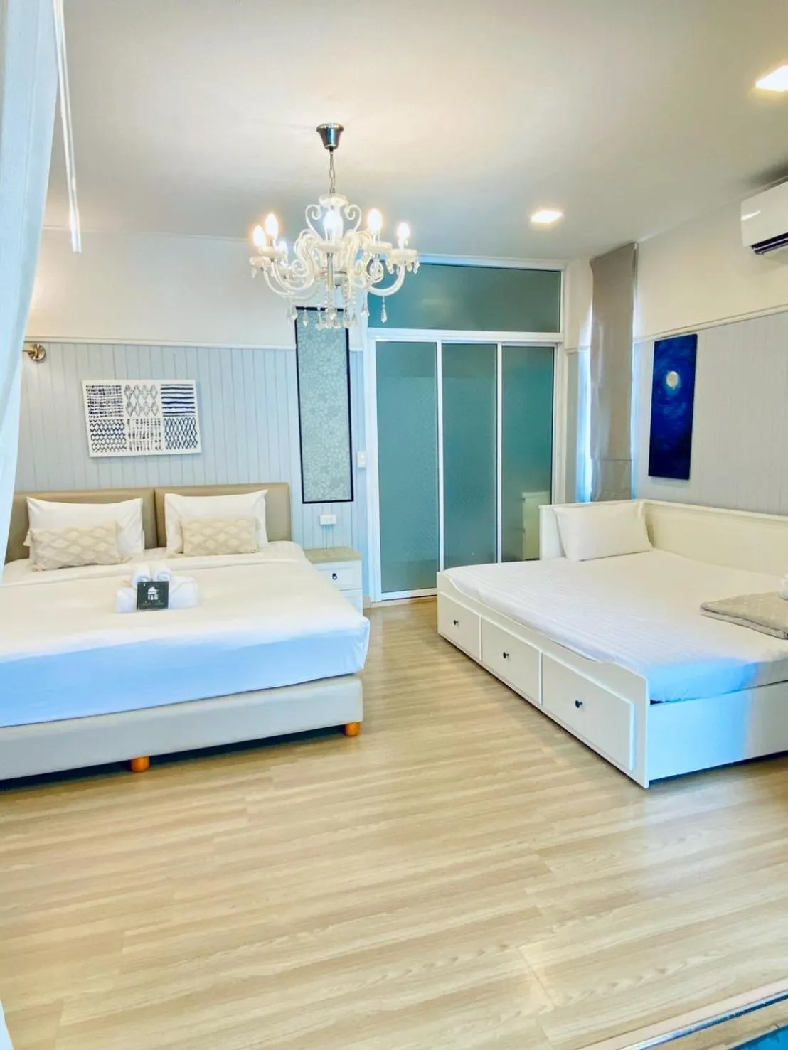 Bed in La Riva Boutique Hotel