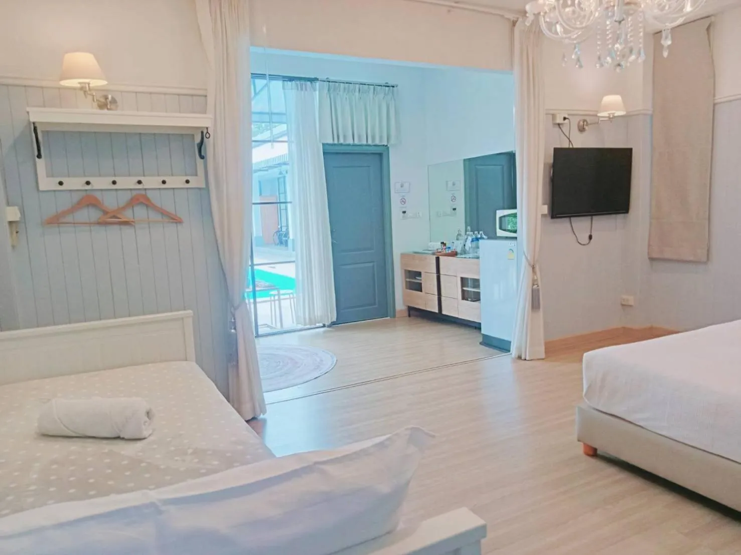 Bed in La Riva Boutique Hotel