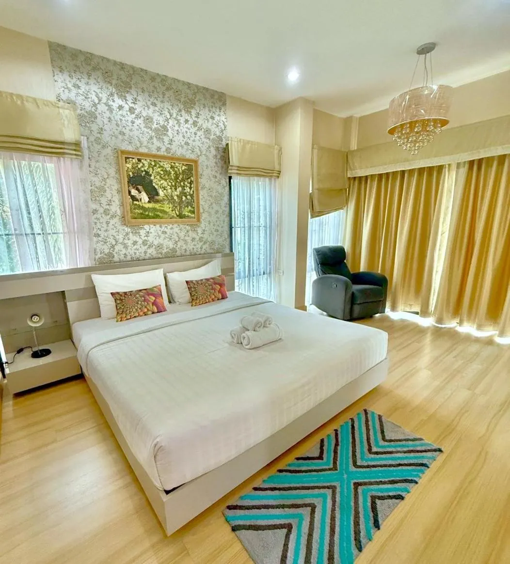 Bed in La Riva Boutique Hotel