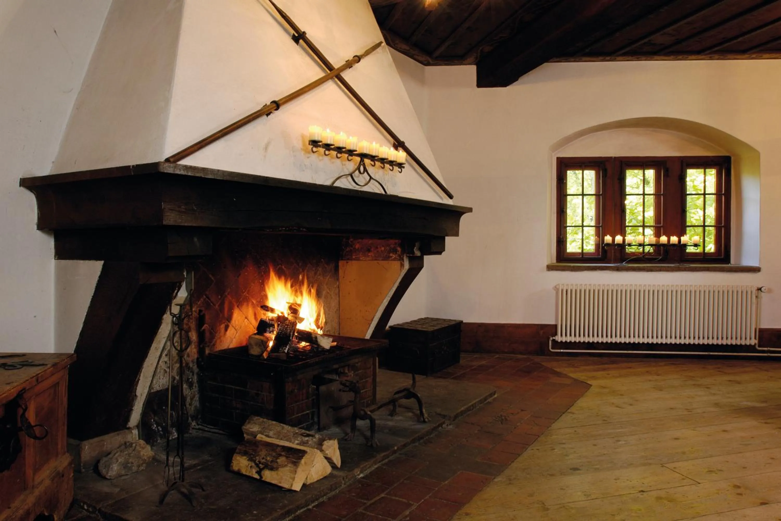 Communal lounge/ TV room in Mariastein-Rotberg Youth Hostel