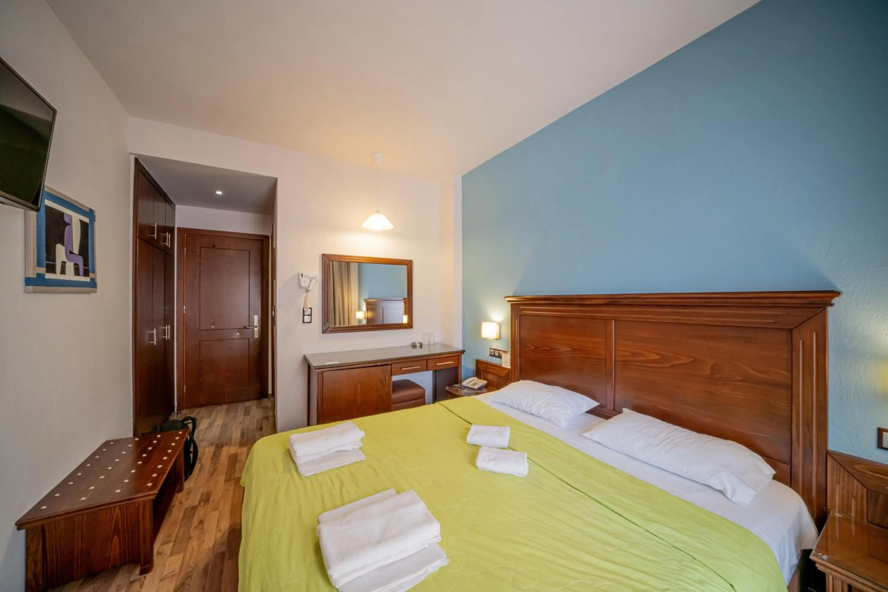 Bed in Hotel Olympion