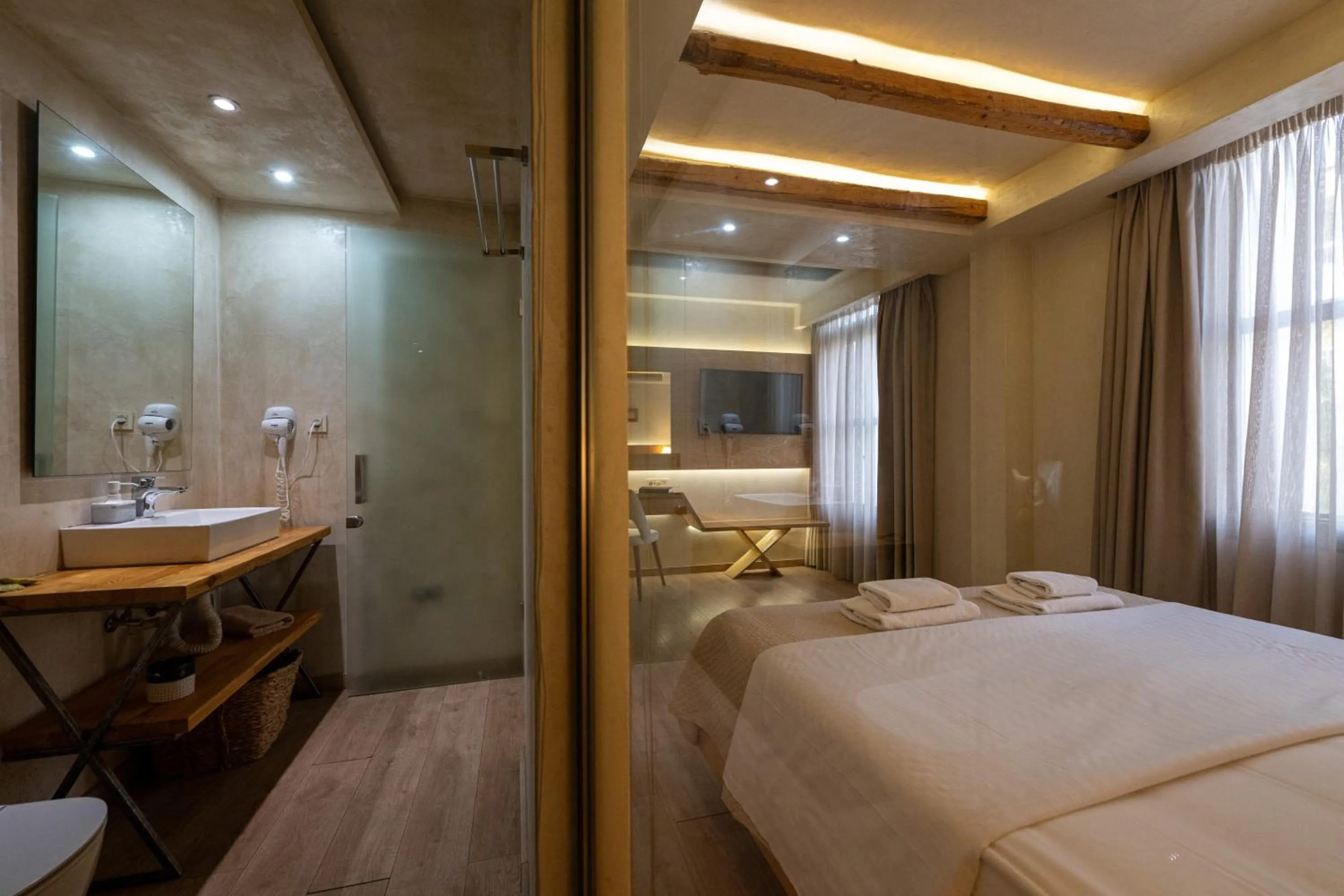 Photo of the whole room, Bed in Panellinion Luxury Rooms