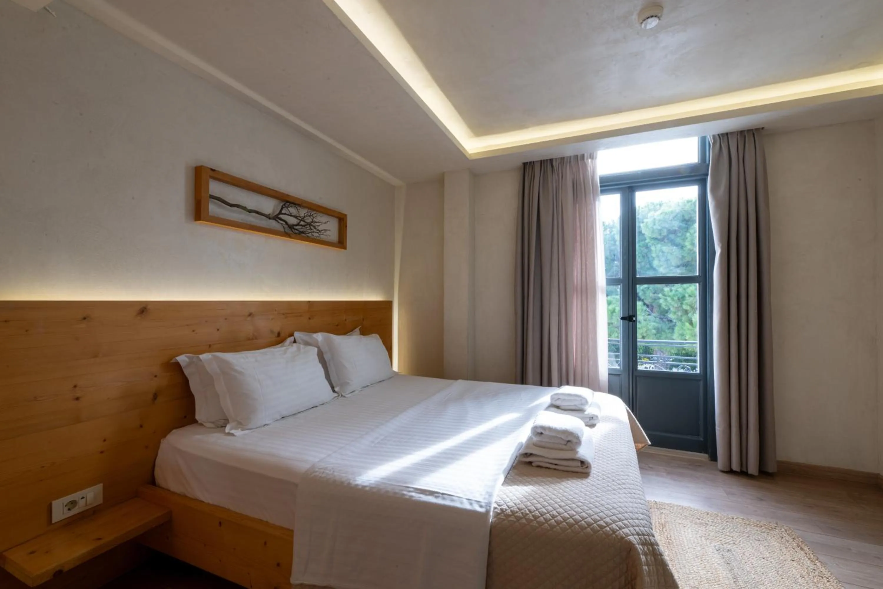 Photo of the whole room, Bed in Panellinion Luxury Rooms