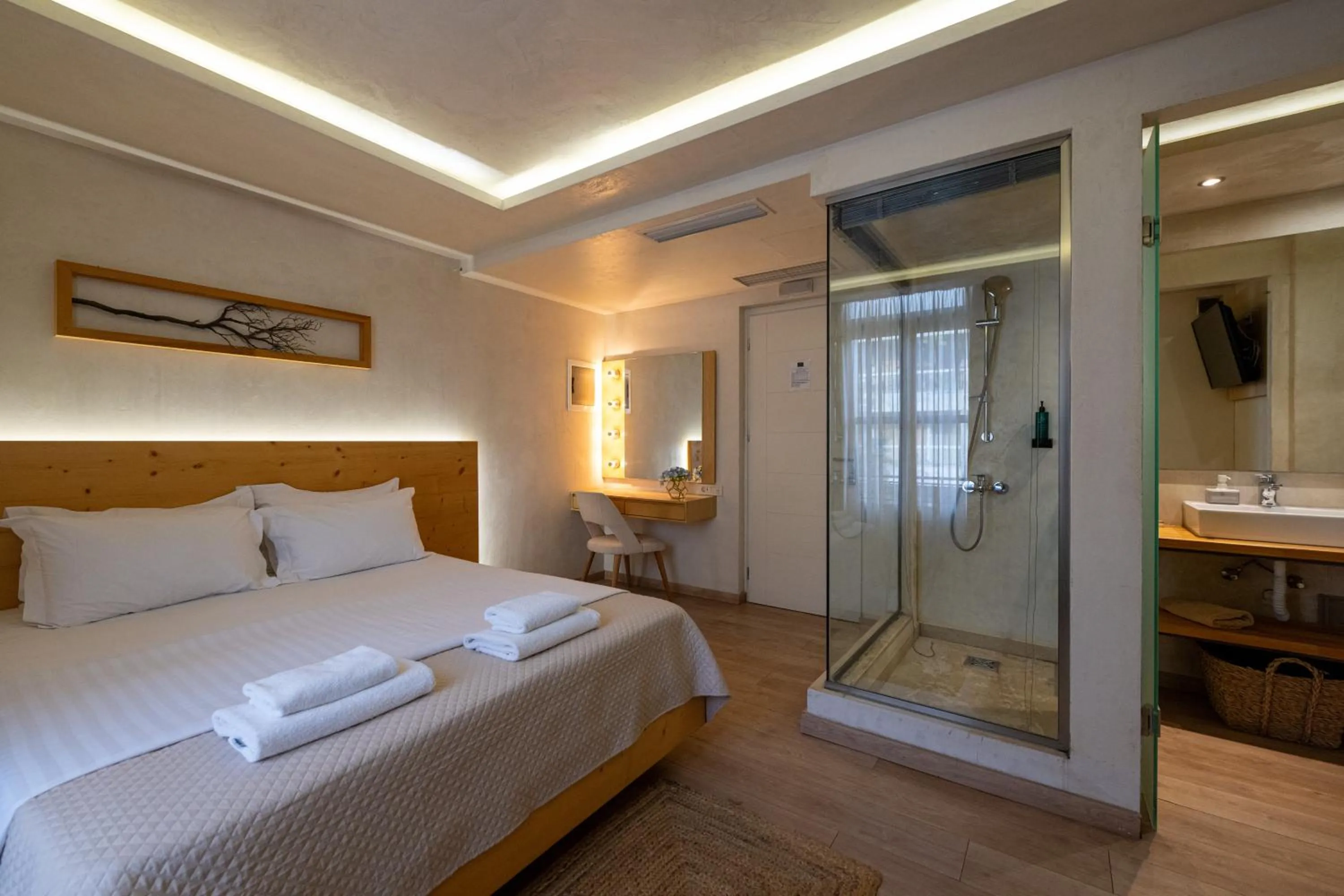 Bed in Panellinion Luxury Rooms