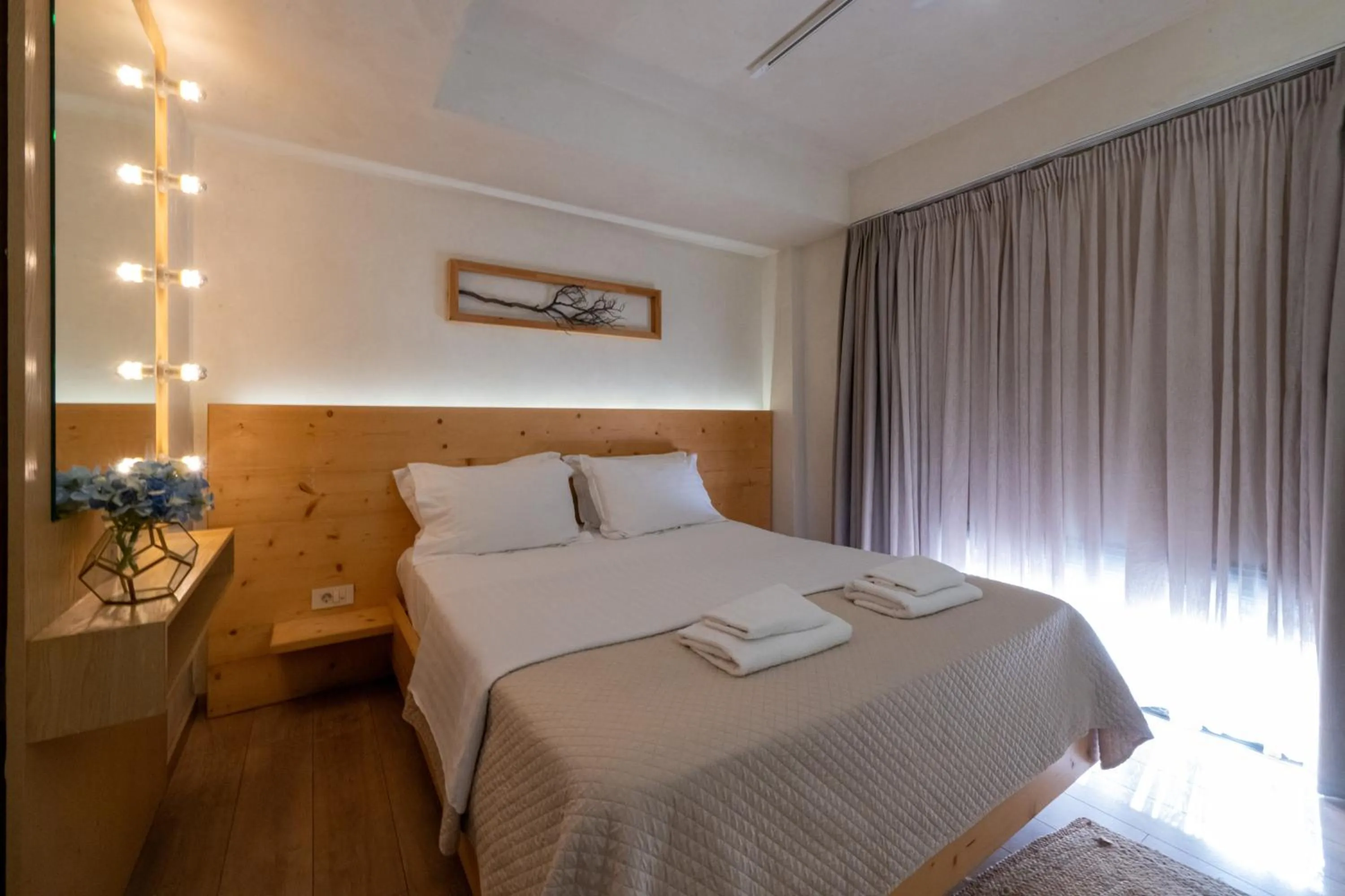 Bed in Panellinion Luxury Rooms