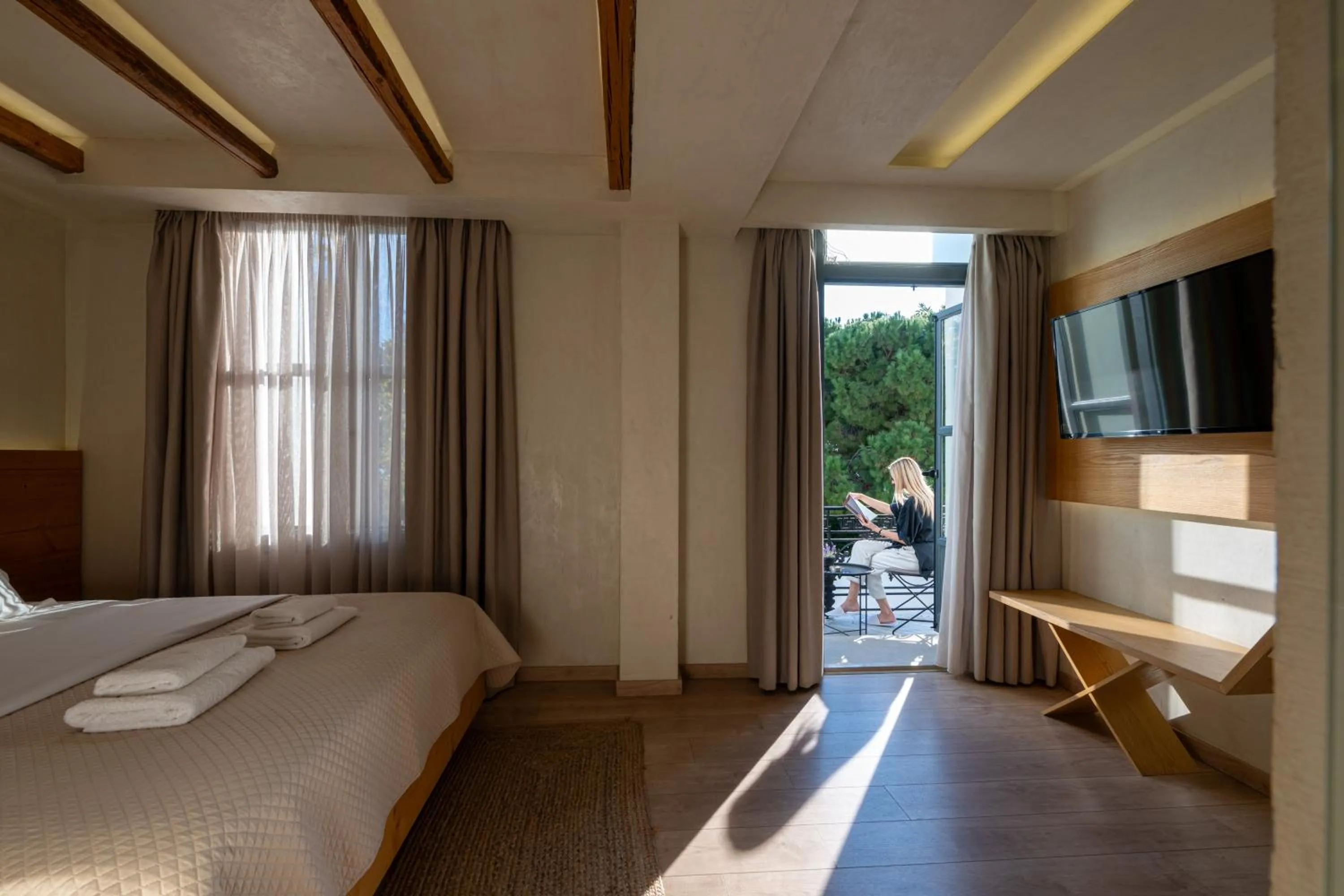 Photo of the whole room, Bed in Panellinion Luxury Rooms