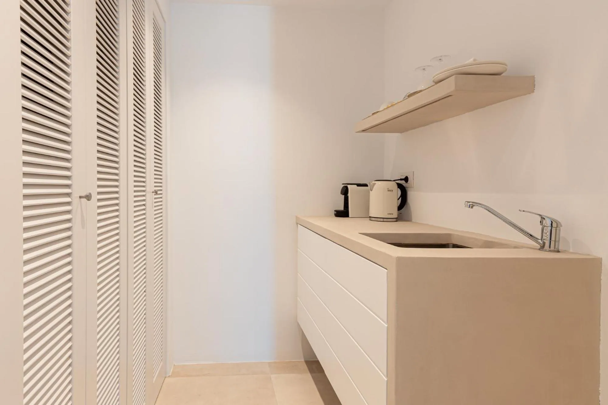 Kitchen or kitchenette in Ariá Estate Suites & Spa