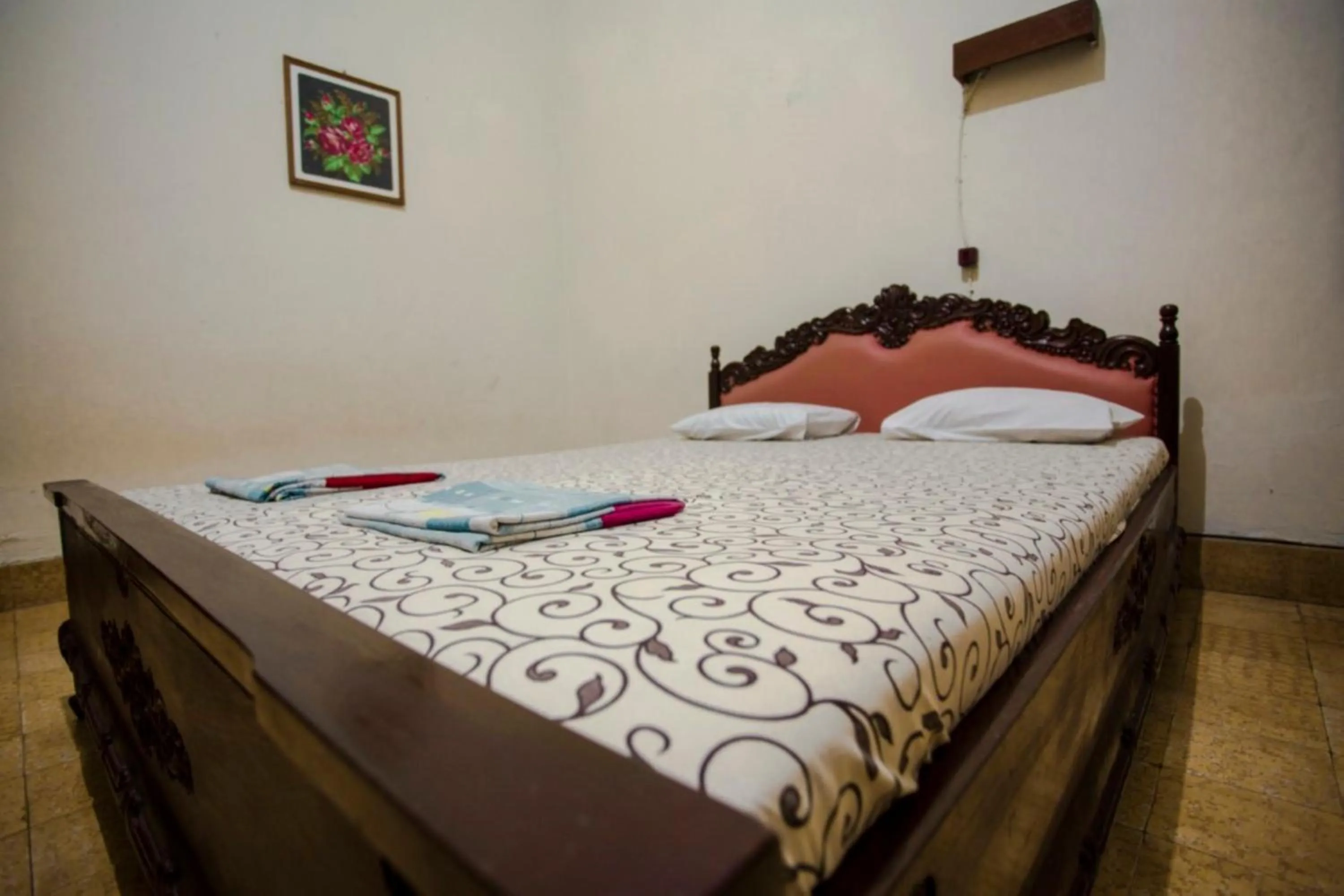 Bed in Hotel Sumaryo