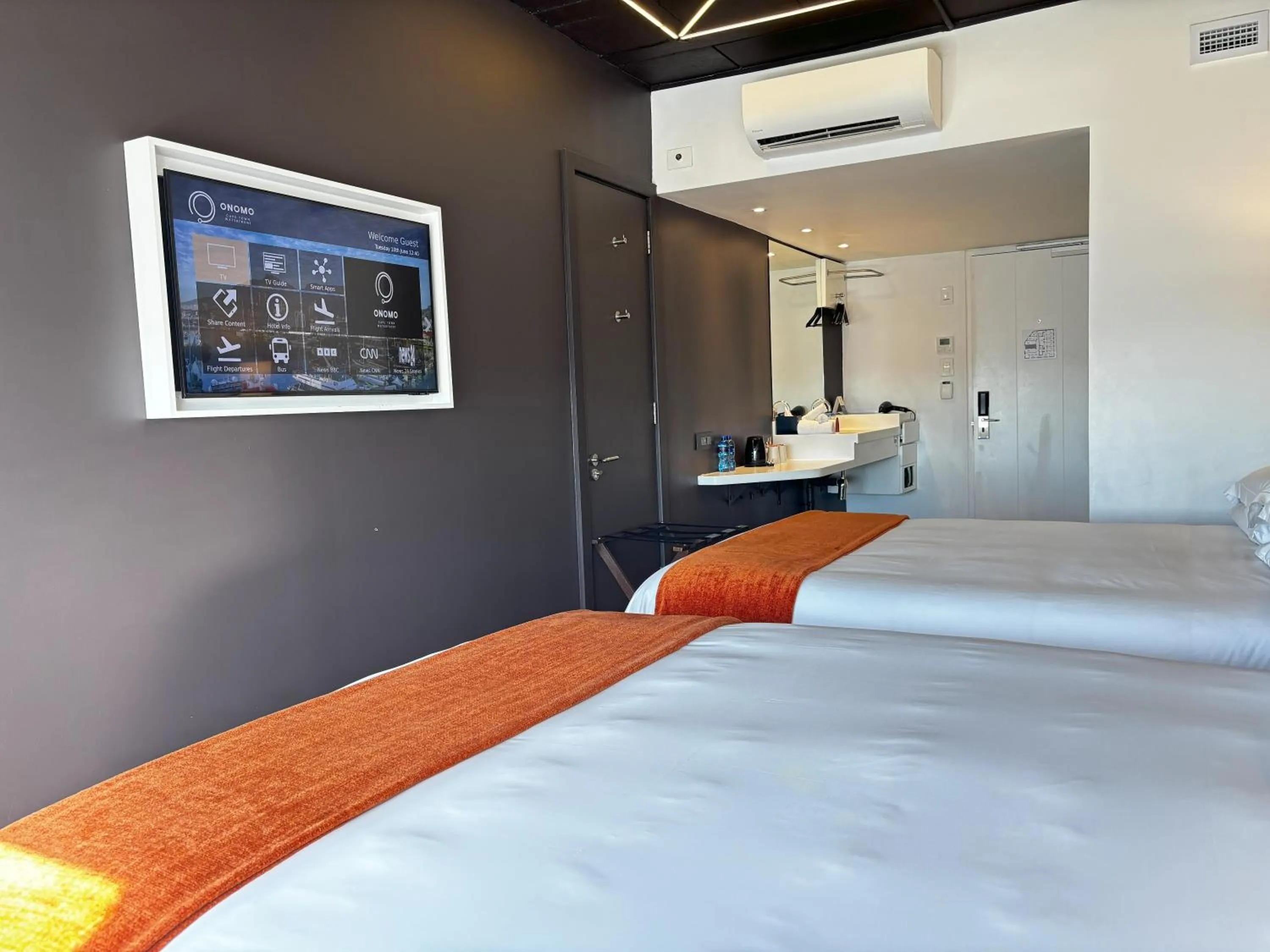 Bed in ONOMO Hotel Waterfront