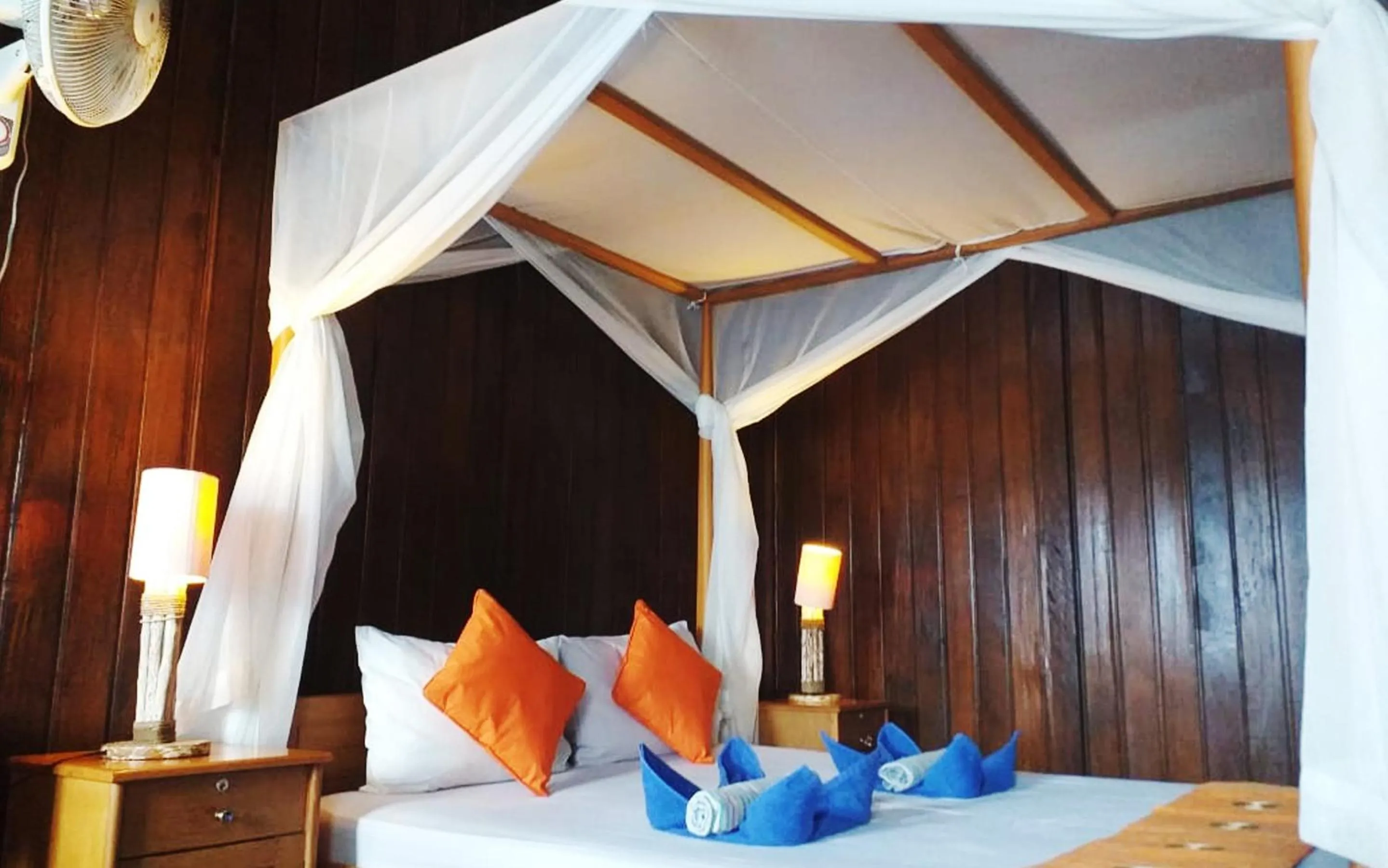 Bed in Bastianos Lembeh Dive Resort
