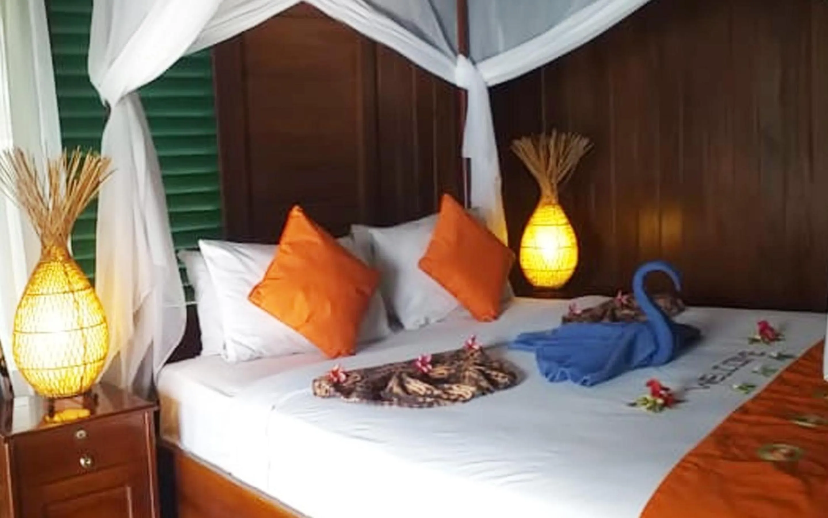 Bed in Bastianos Lembeh Dive Resort