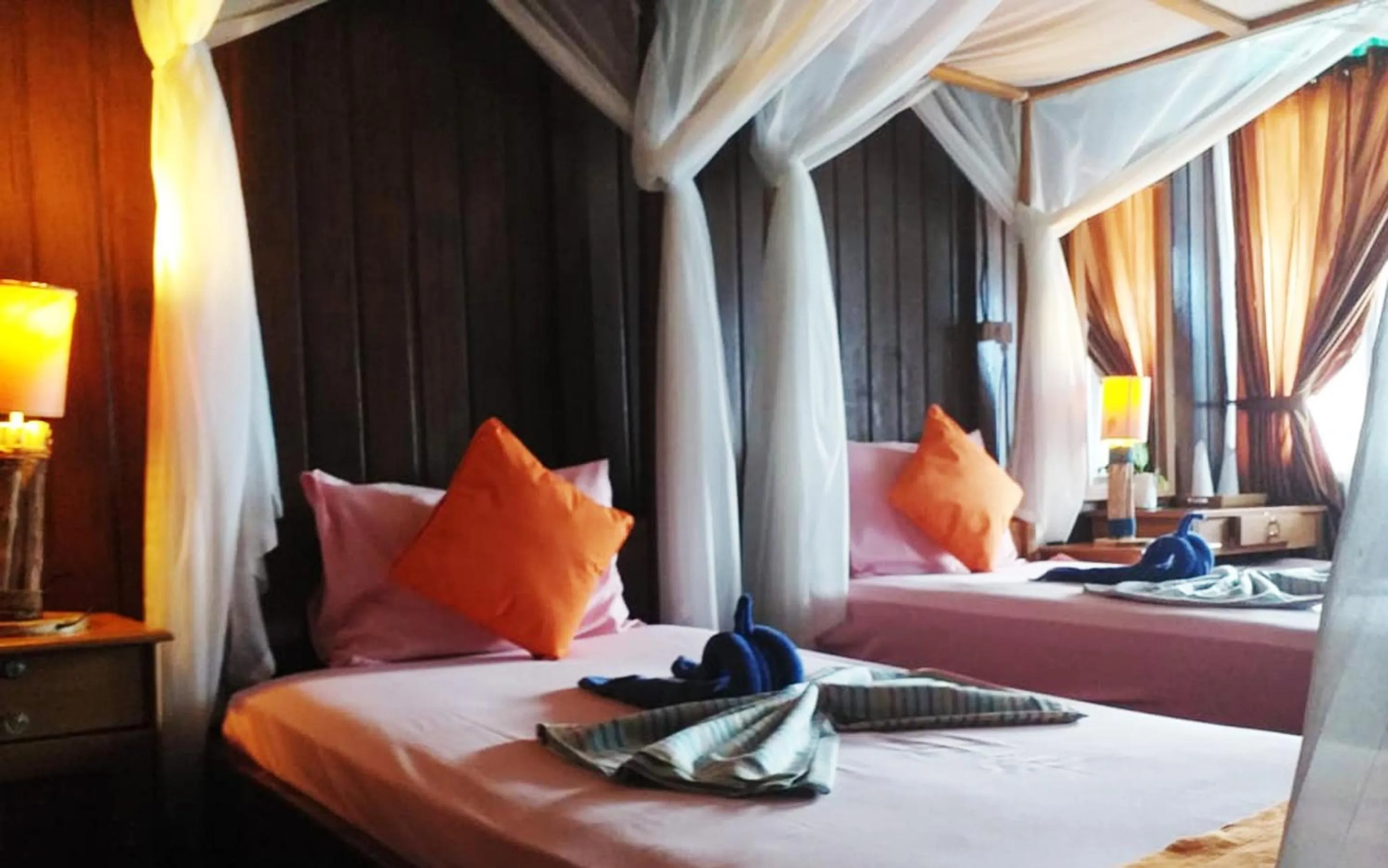 Bed in Bastianos Lembeh Dive Resort