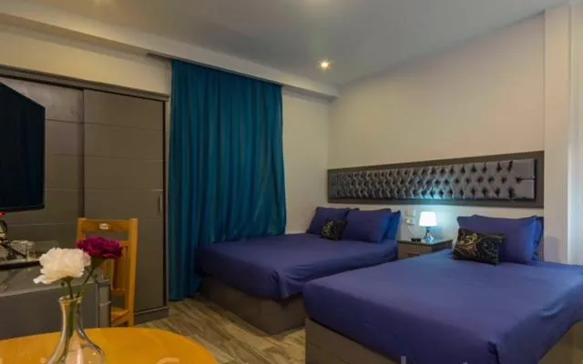 Decorative detail, Bed in Pyramids View Inn Bed & Breakfast