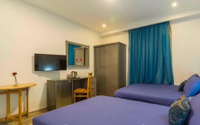 Bedroom, Bed in Pyramids View Inn Bed & Breakfast