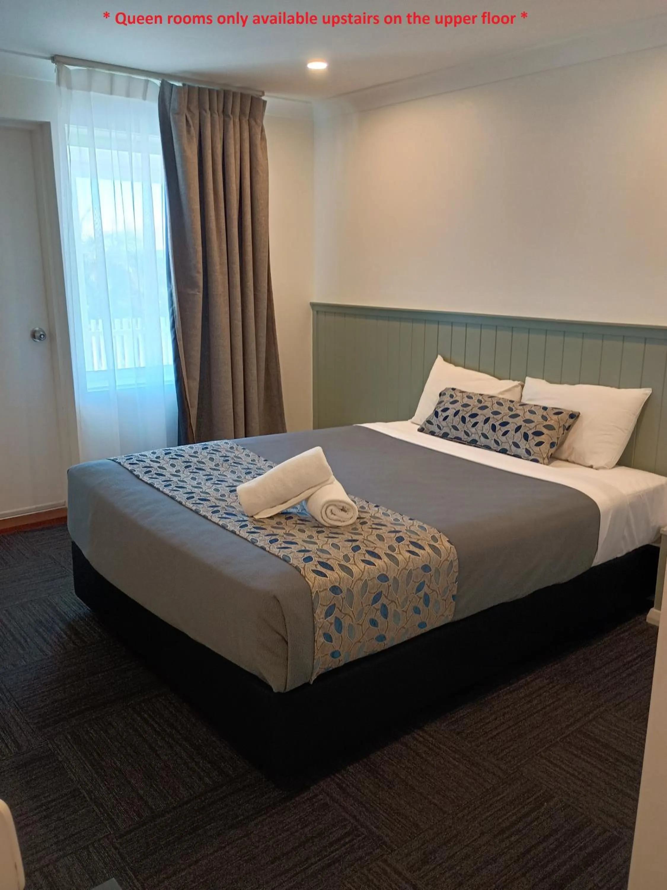 Bed in Surf Beach Motel Newcastle