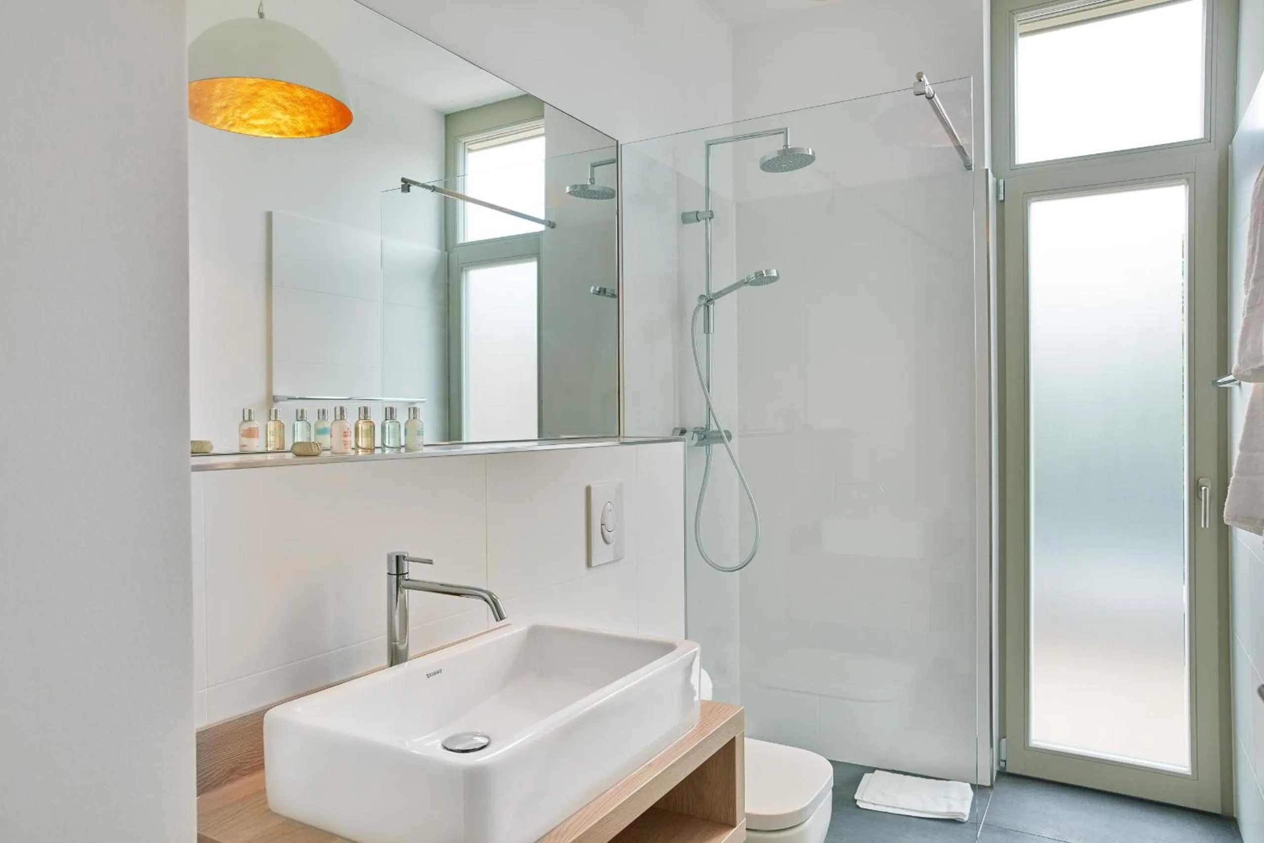 Bathroom in Park Penthouses Insel Eiswerder by Suite030