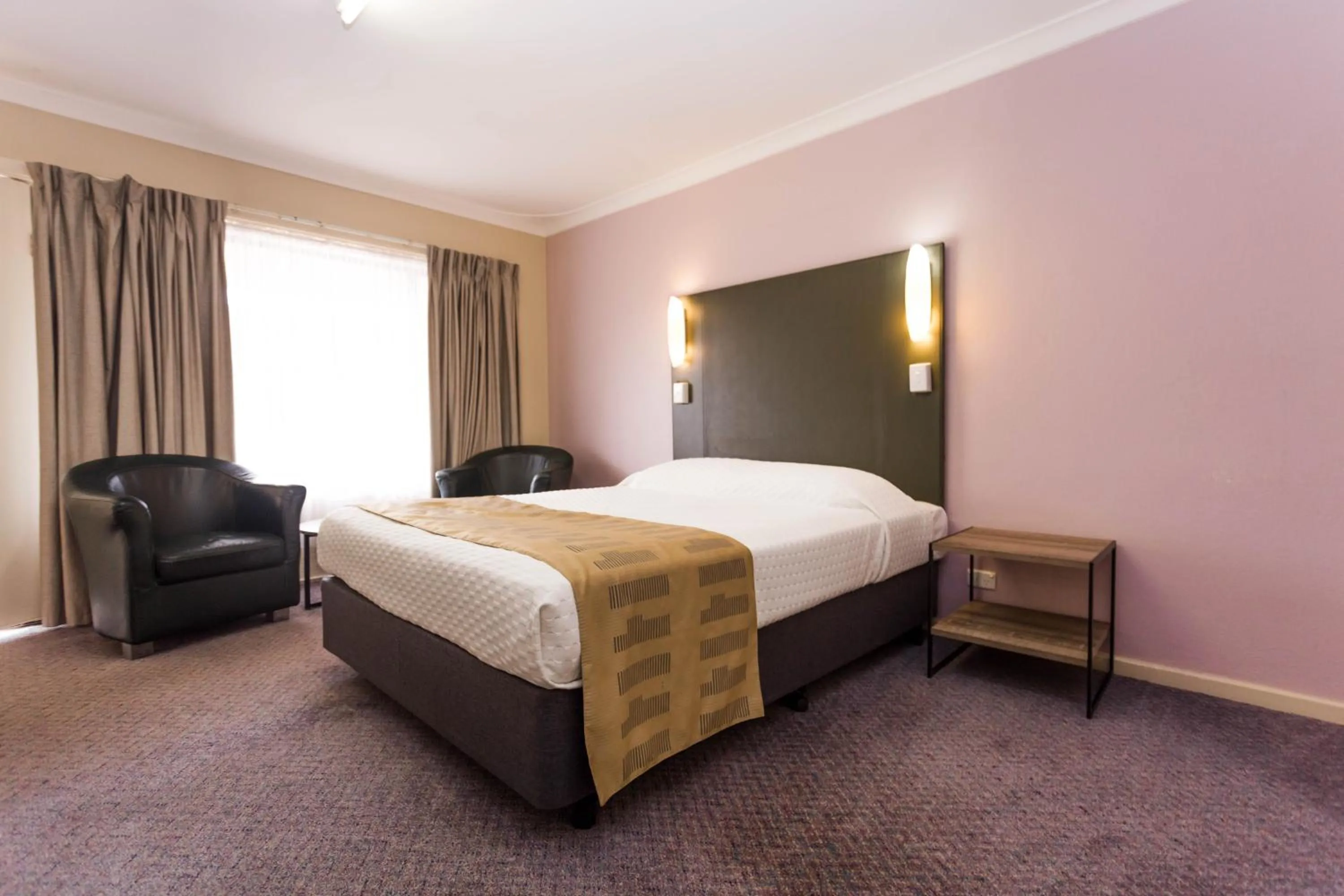 Bed in Sleepwell Motel