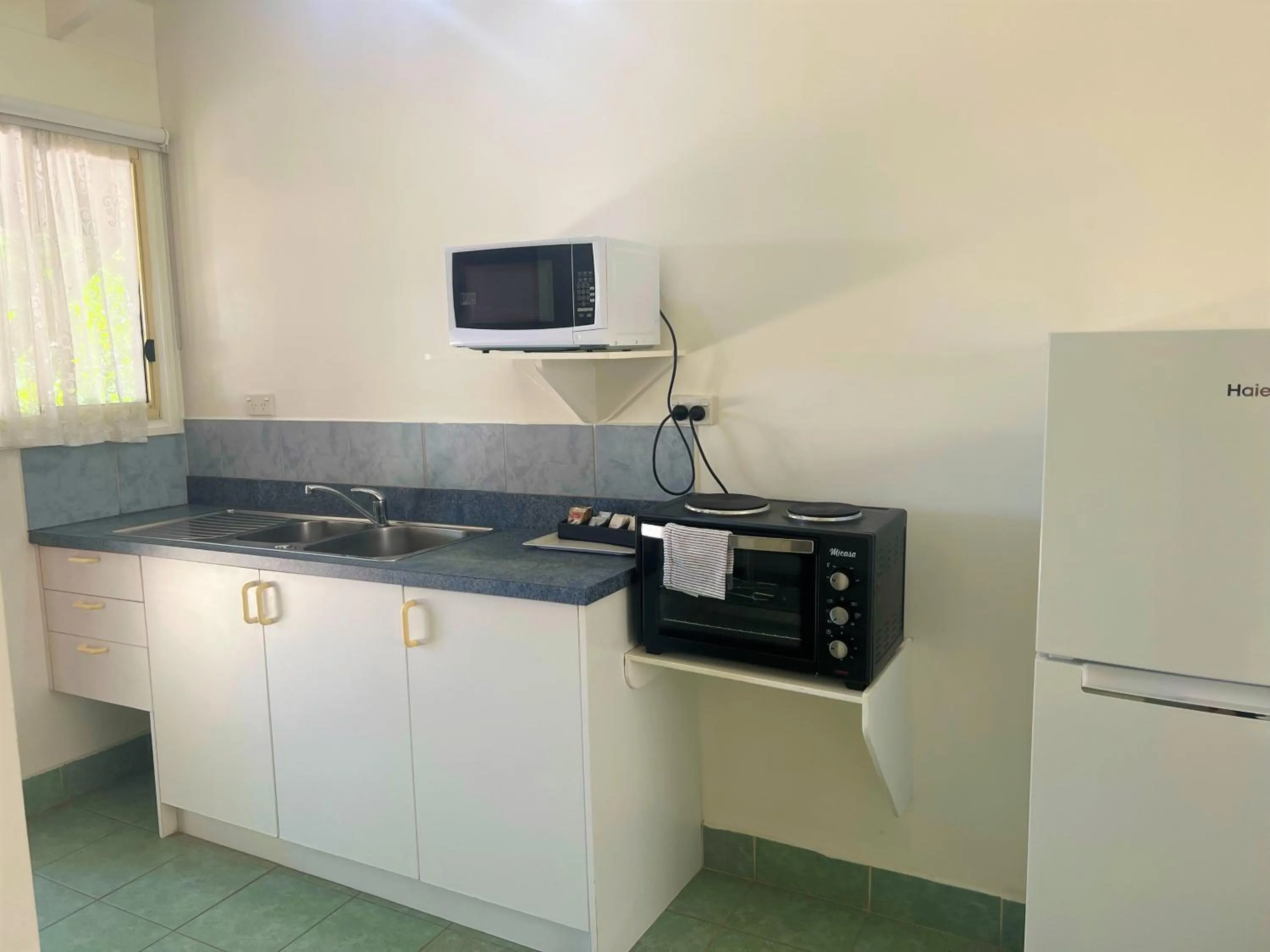 Kitchen or kitchenette in Club Raro Resort - Adults Only