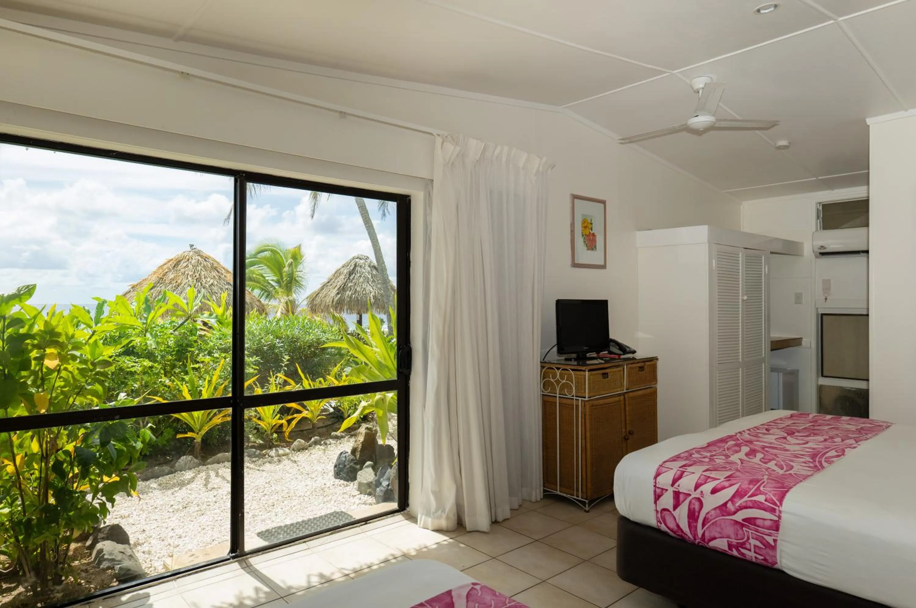Photo of the whole room, Bed in Club Raro Resort - Adults Only