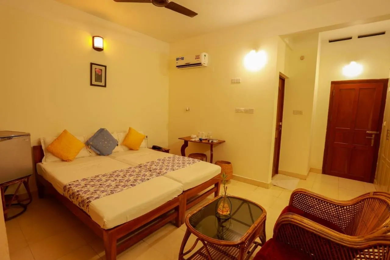 Bed in The Sanctum Spring Beach Resort