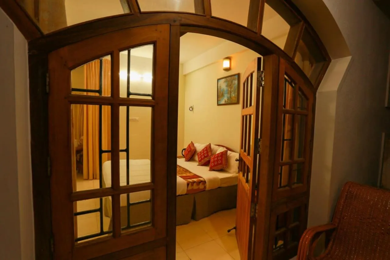 Bed in The Sanctum Spring Beach Resort