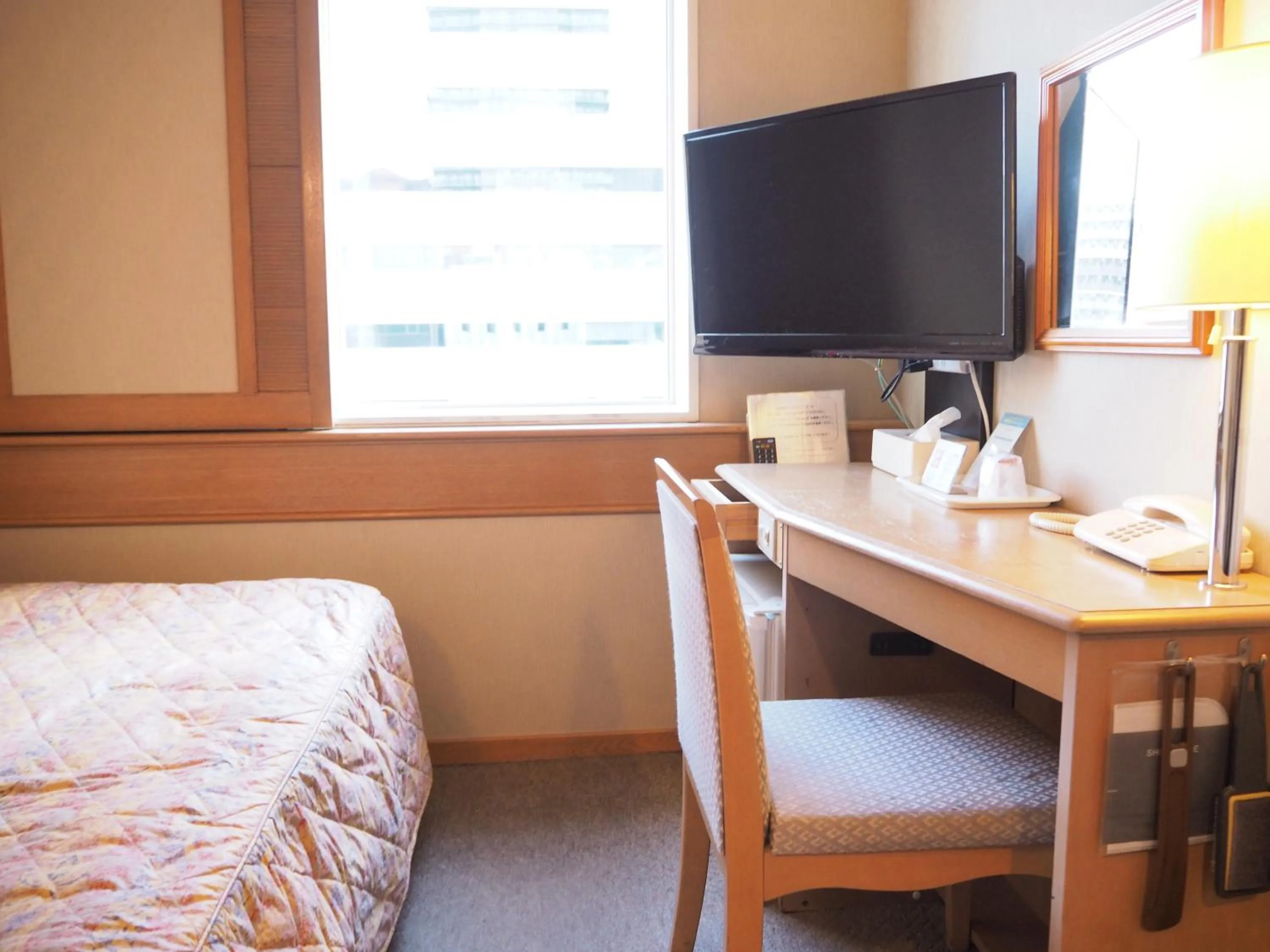 Photo of the whole room, TV/Entertainment Center in Sanside Hotel