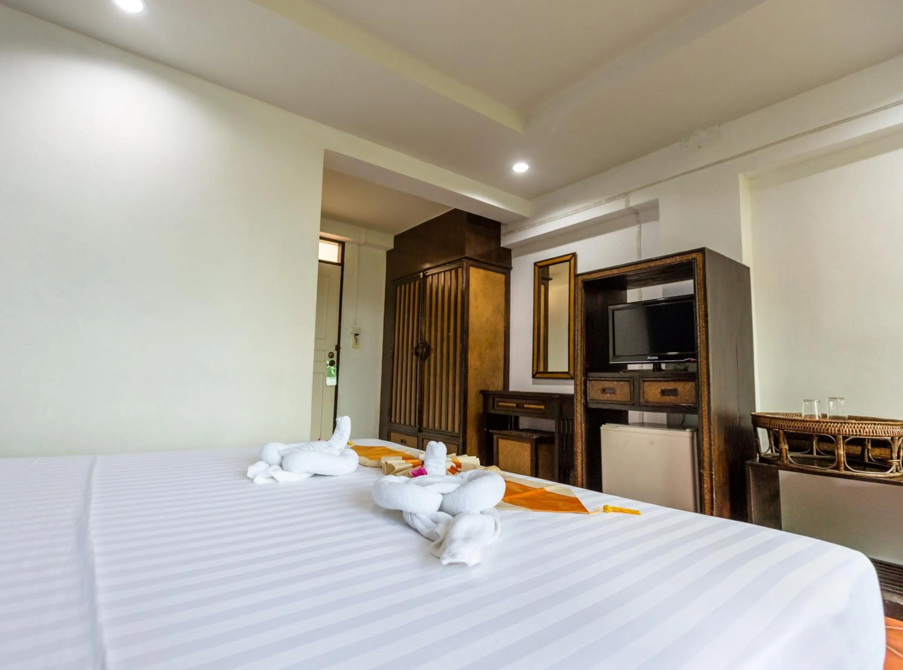 Bed in PorterHouse Beach Hotel