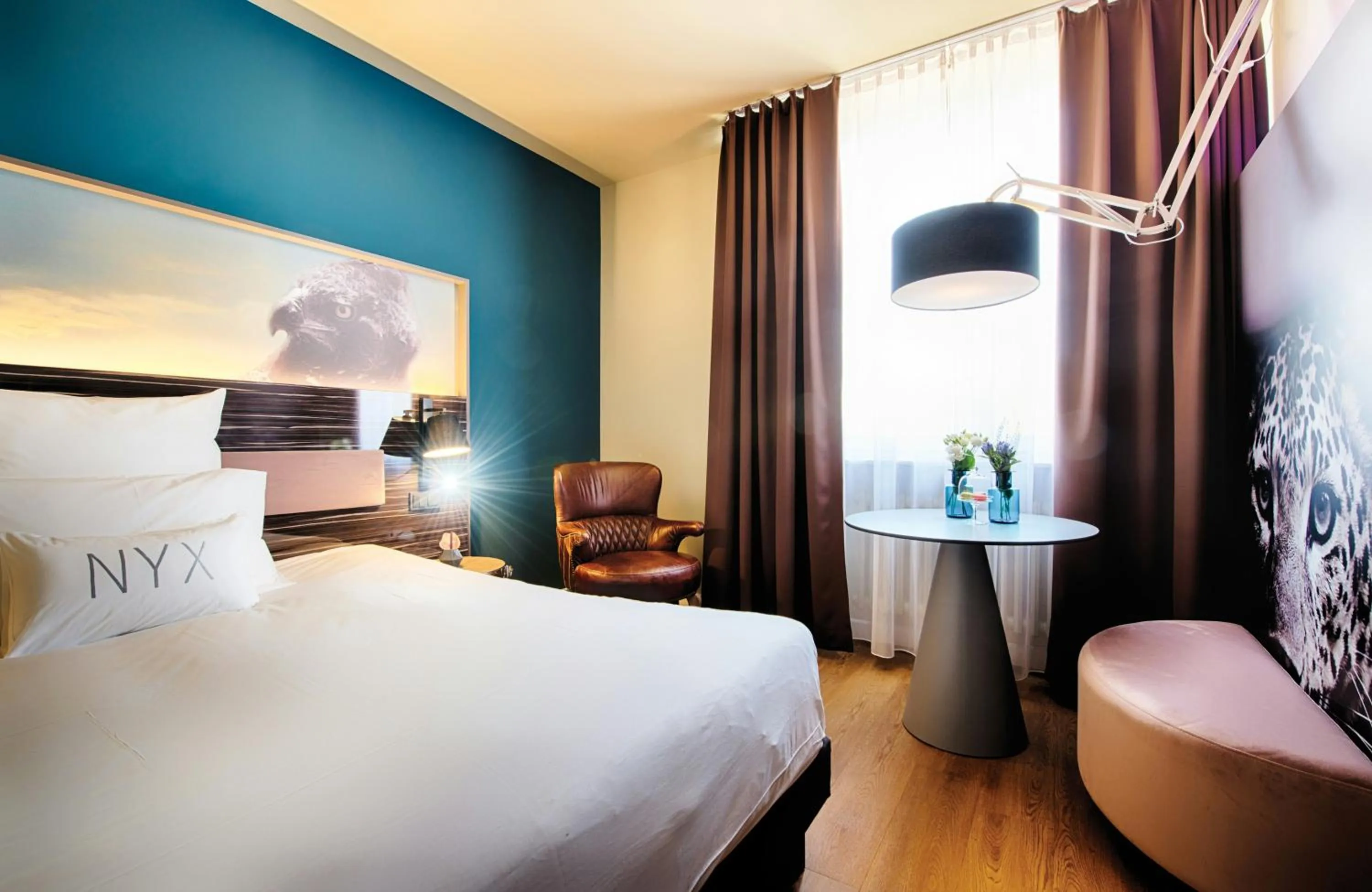 Photo of the whole room, Bed in NYX Hotel Mannheim by Leonardo Hotels