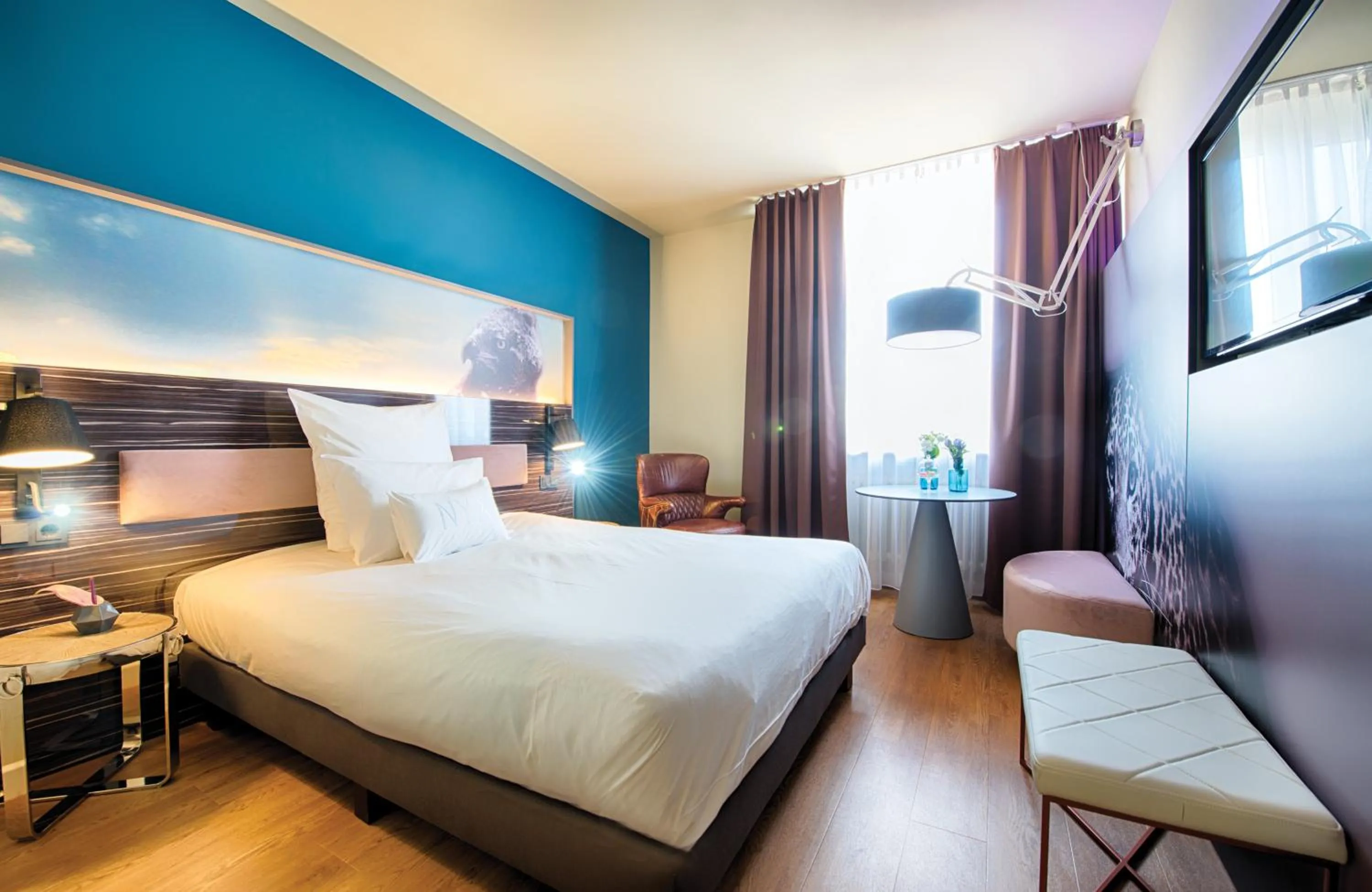 Photo of the whole room, Bed in NYX Hotel Mannheim by Leonardo Hotels