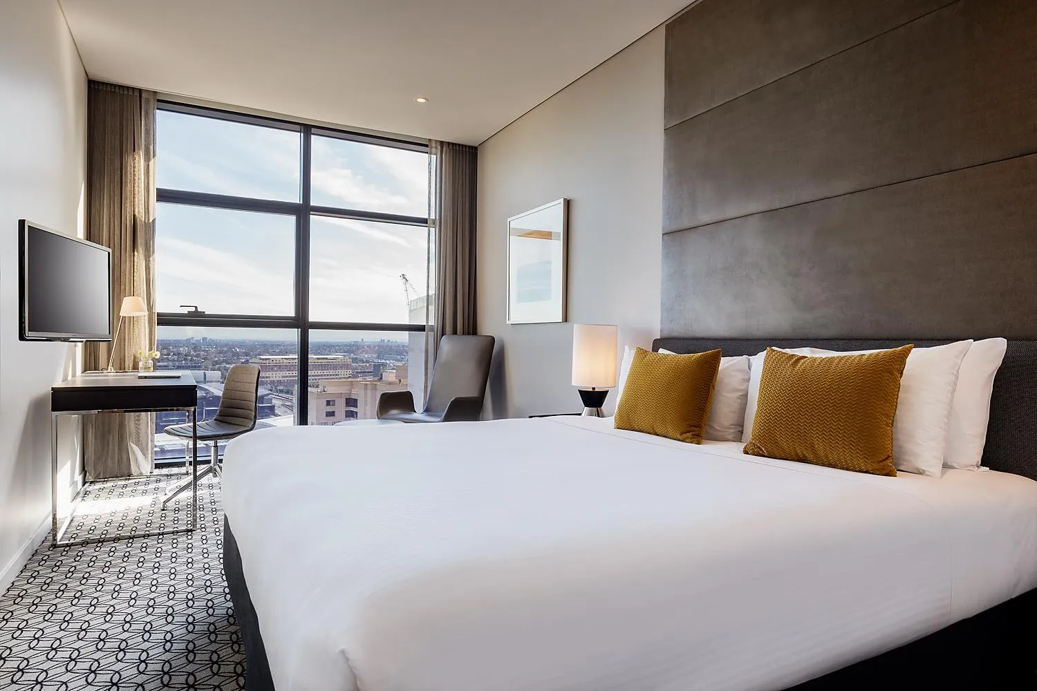 Bed in Fraser Suites Sydney